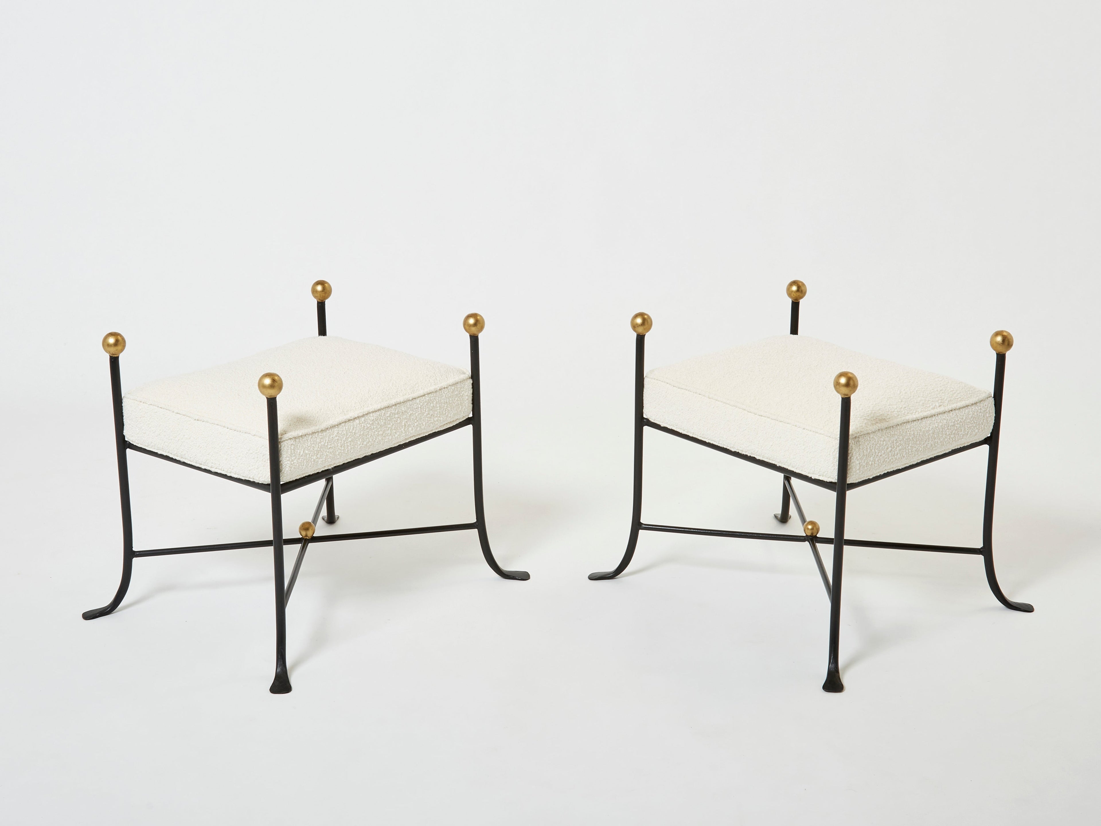 Pair of French 1950s wrought iron and gold leaf bouclé stools