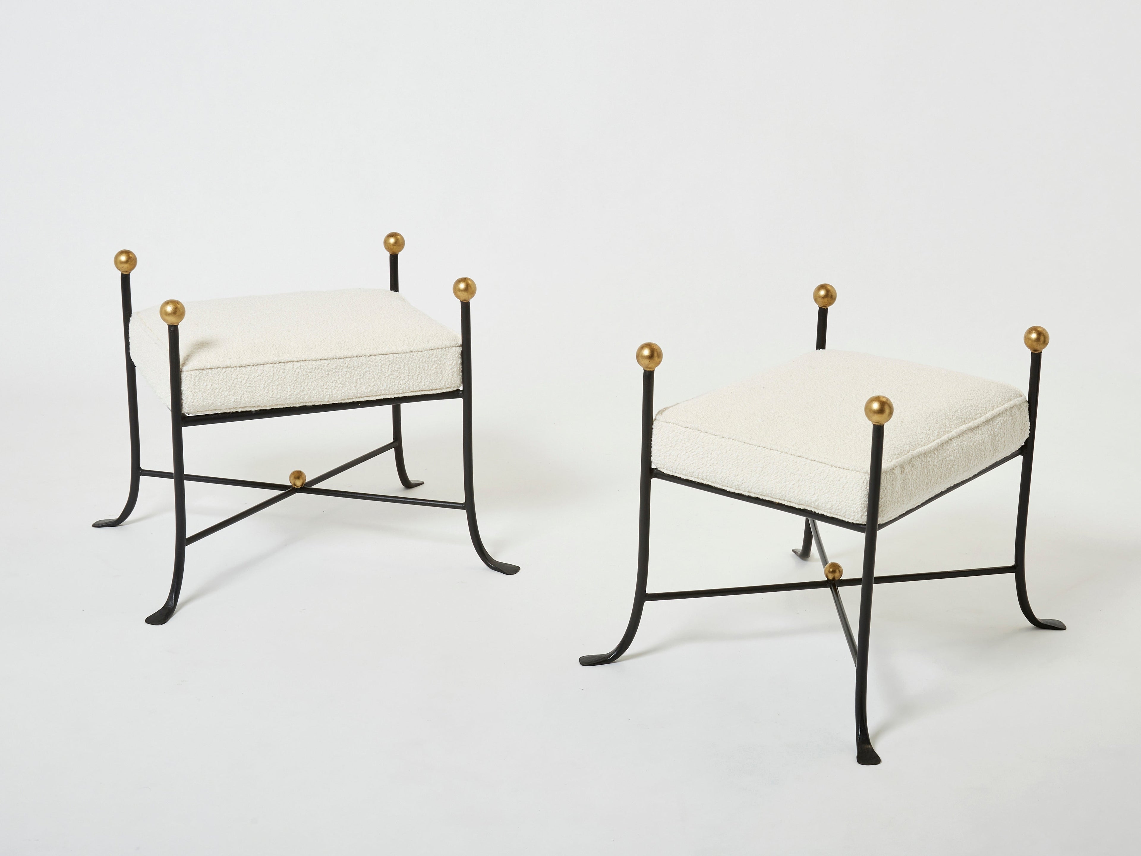 Pair of French 1950s wrought iron and gold leaf bouclé stools