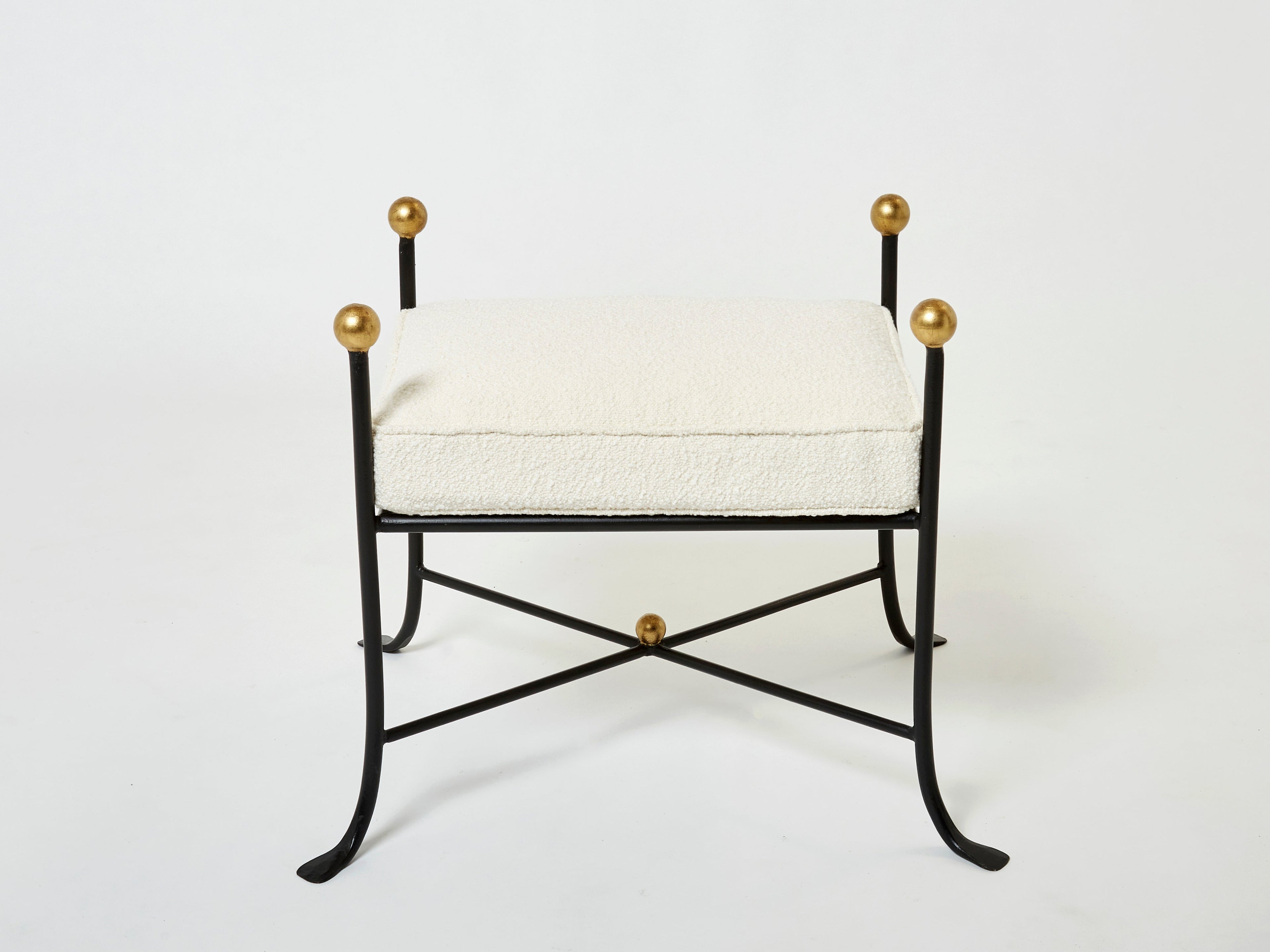 Pair of French 1950s wrought iron and gold leaf bouclé stools