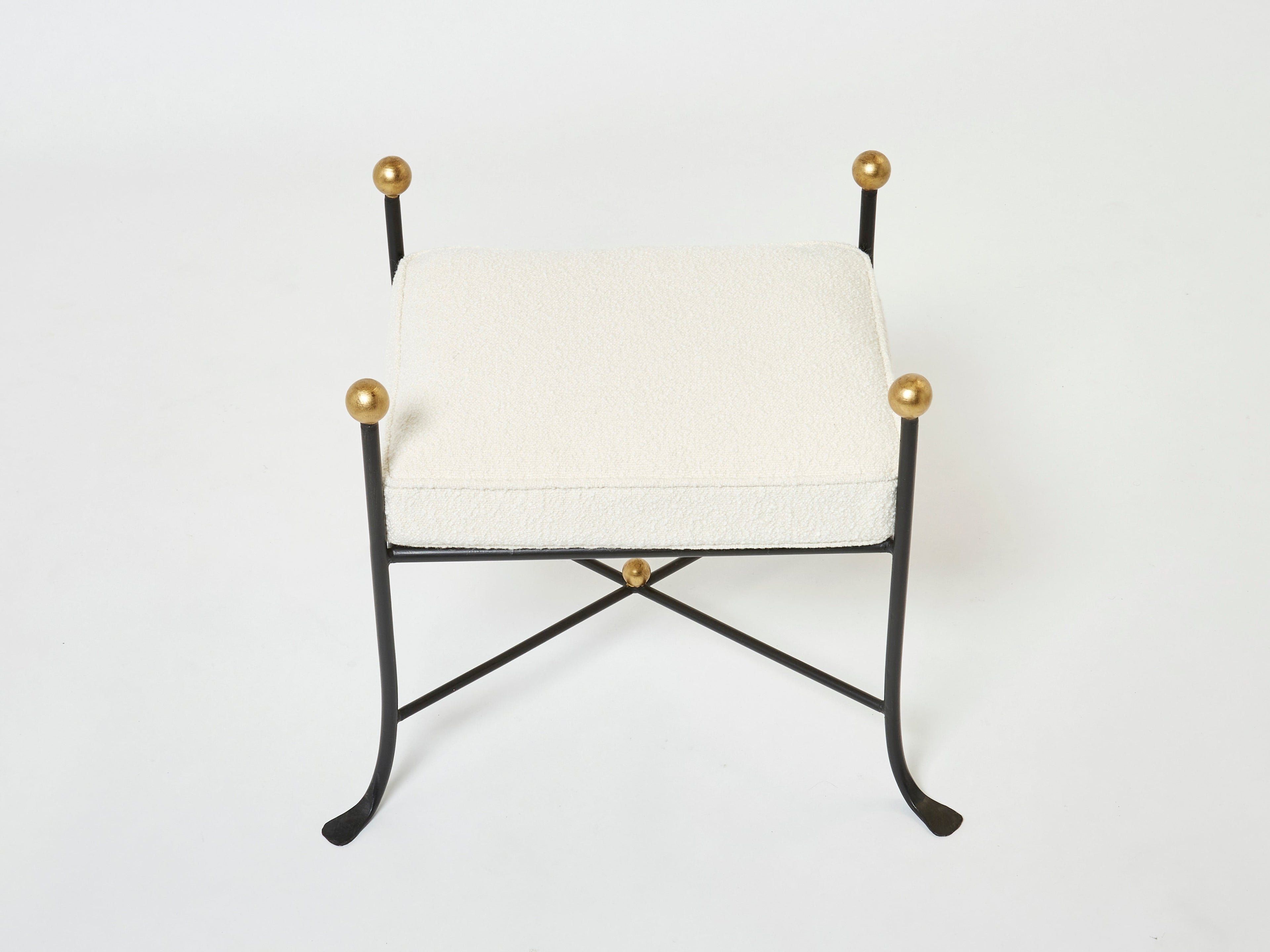 Pair of French 1950s wrought iron and gold leaf bouclé stools