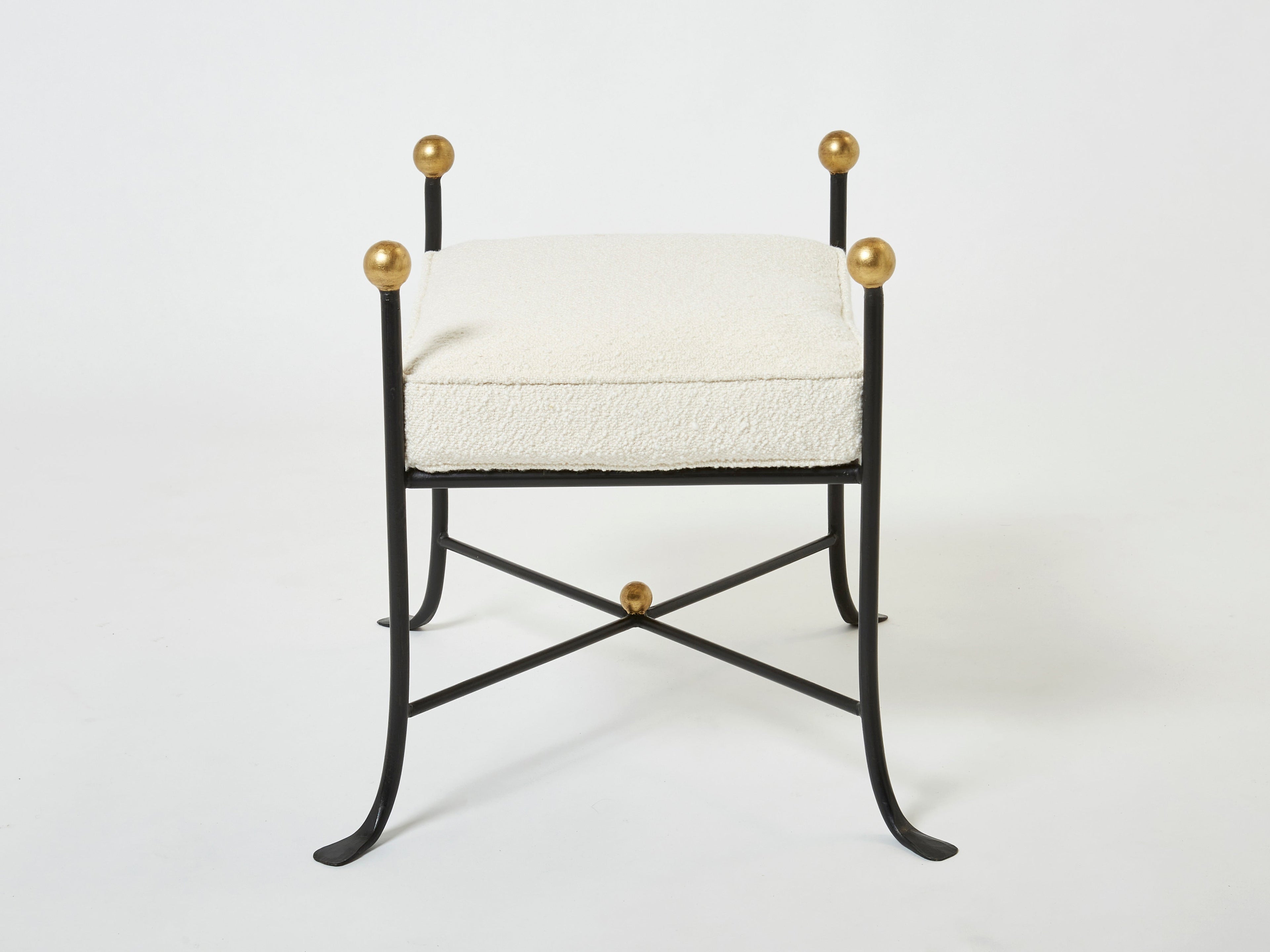 Pair of French 1950s wrought iron and gold leaf bouclé stools