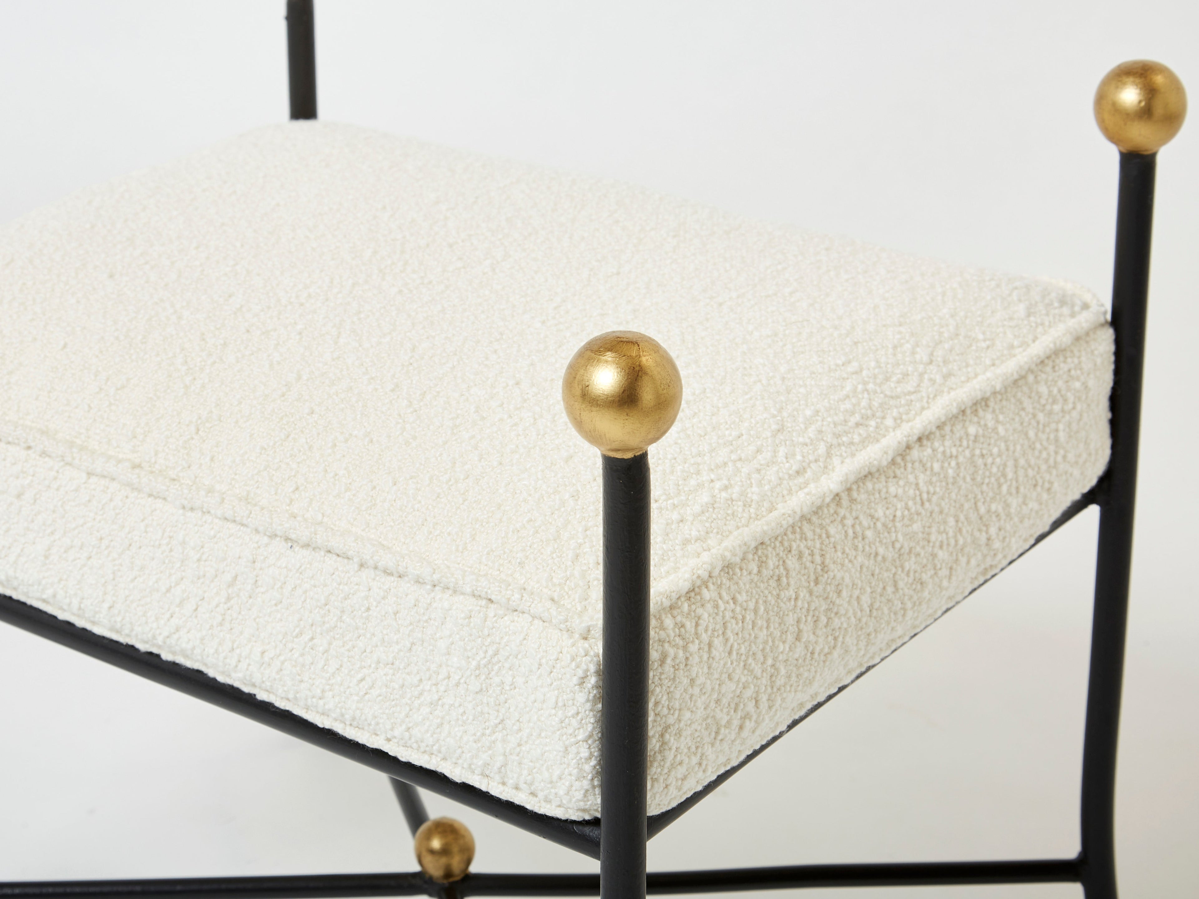 Pair of French 1950s wrought iron and gold leaf bouclé stools