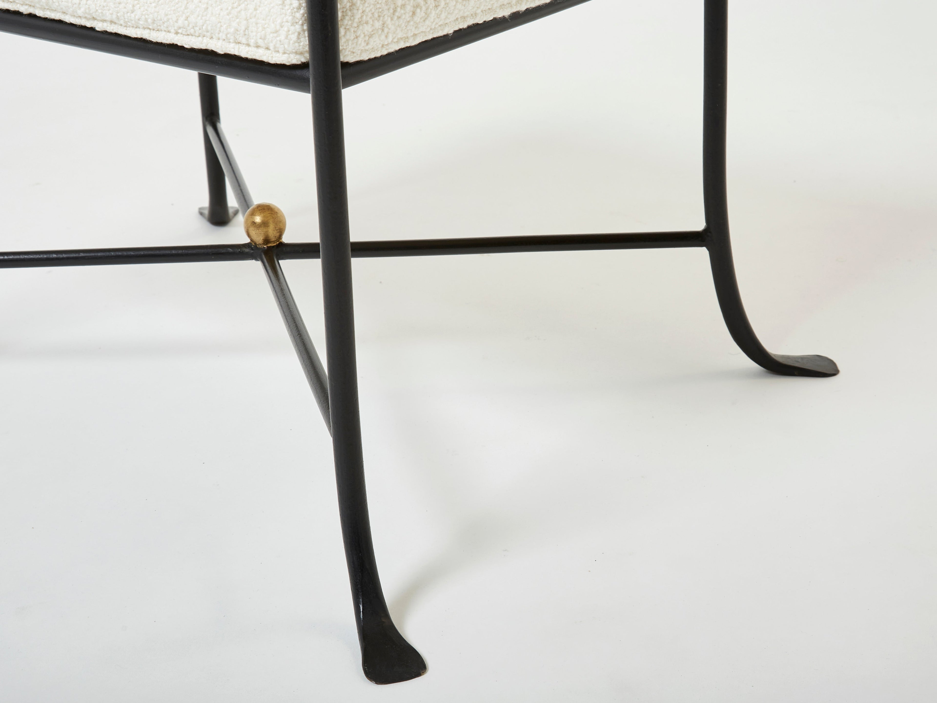 Pair of French 1950s wrought iron and gold leaf bouclé stools
