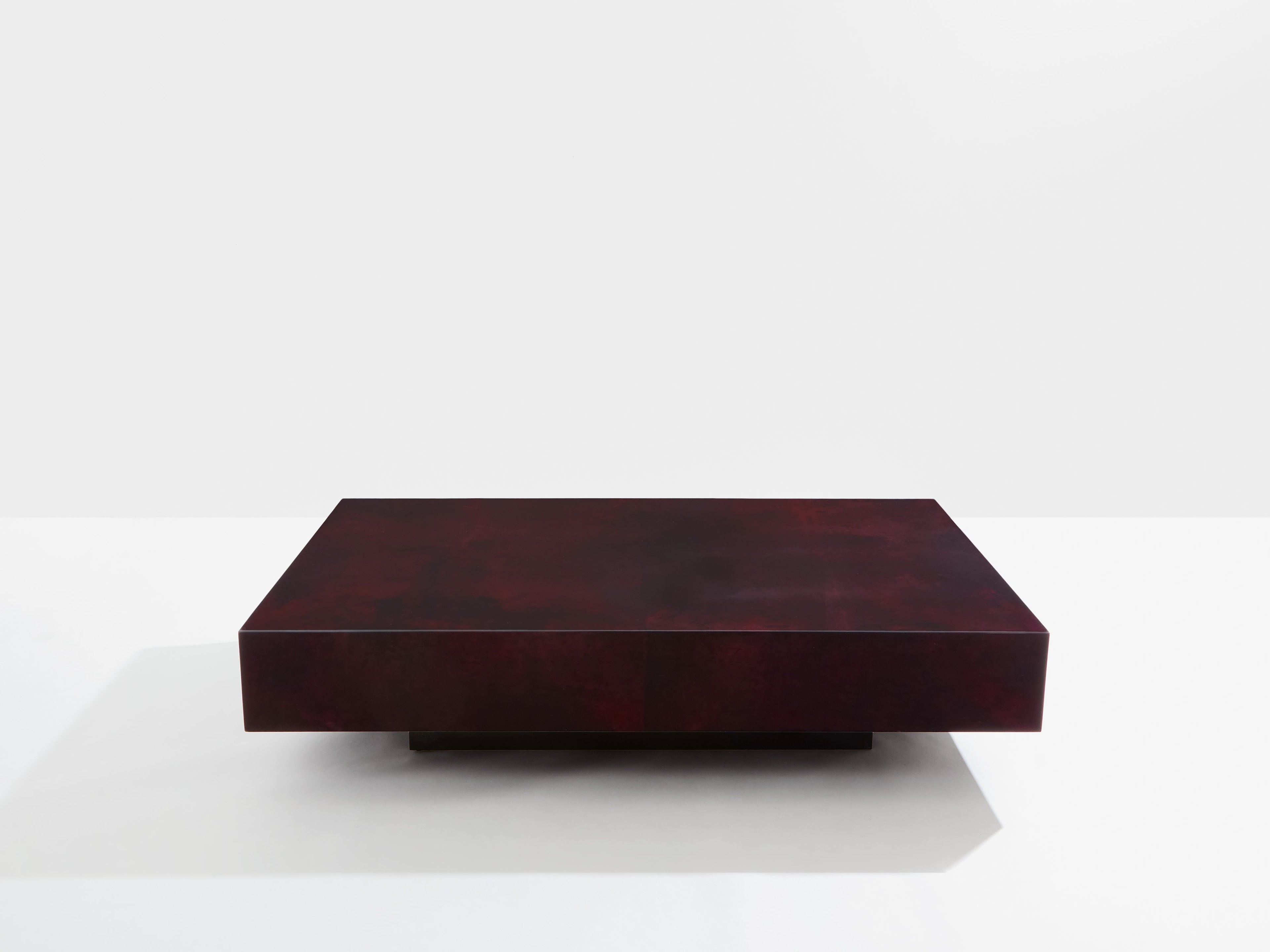 Burgundy red goatskin parchment coffee table by Aldo Tura 1960s