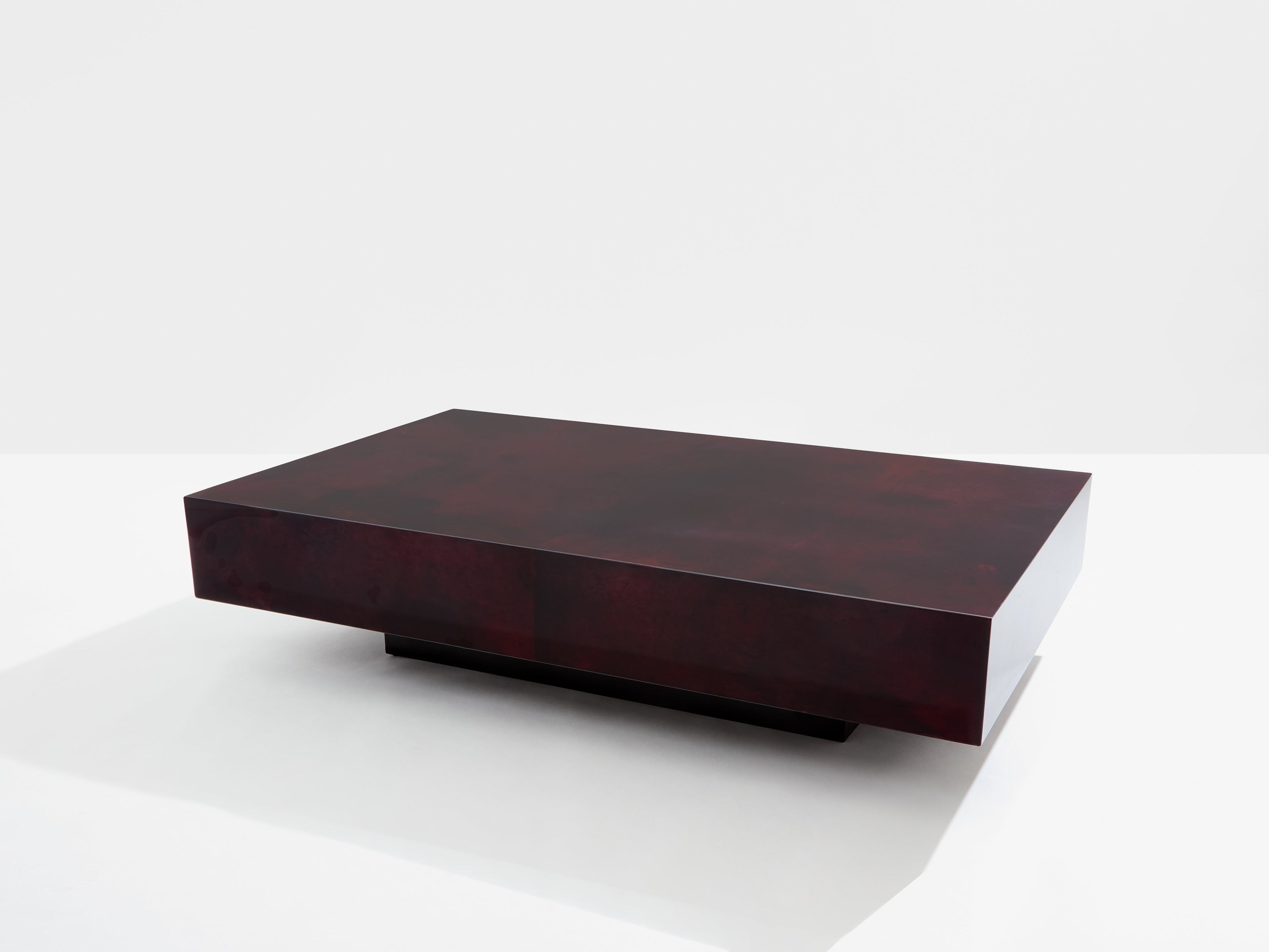 Burgundy red goatskin parchment coffee table by Aldo Tura 1960s