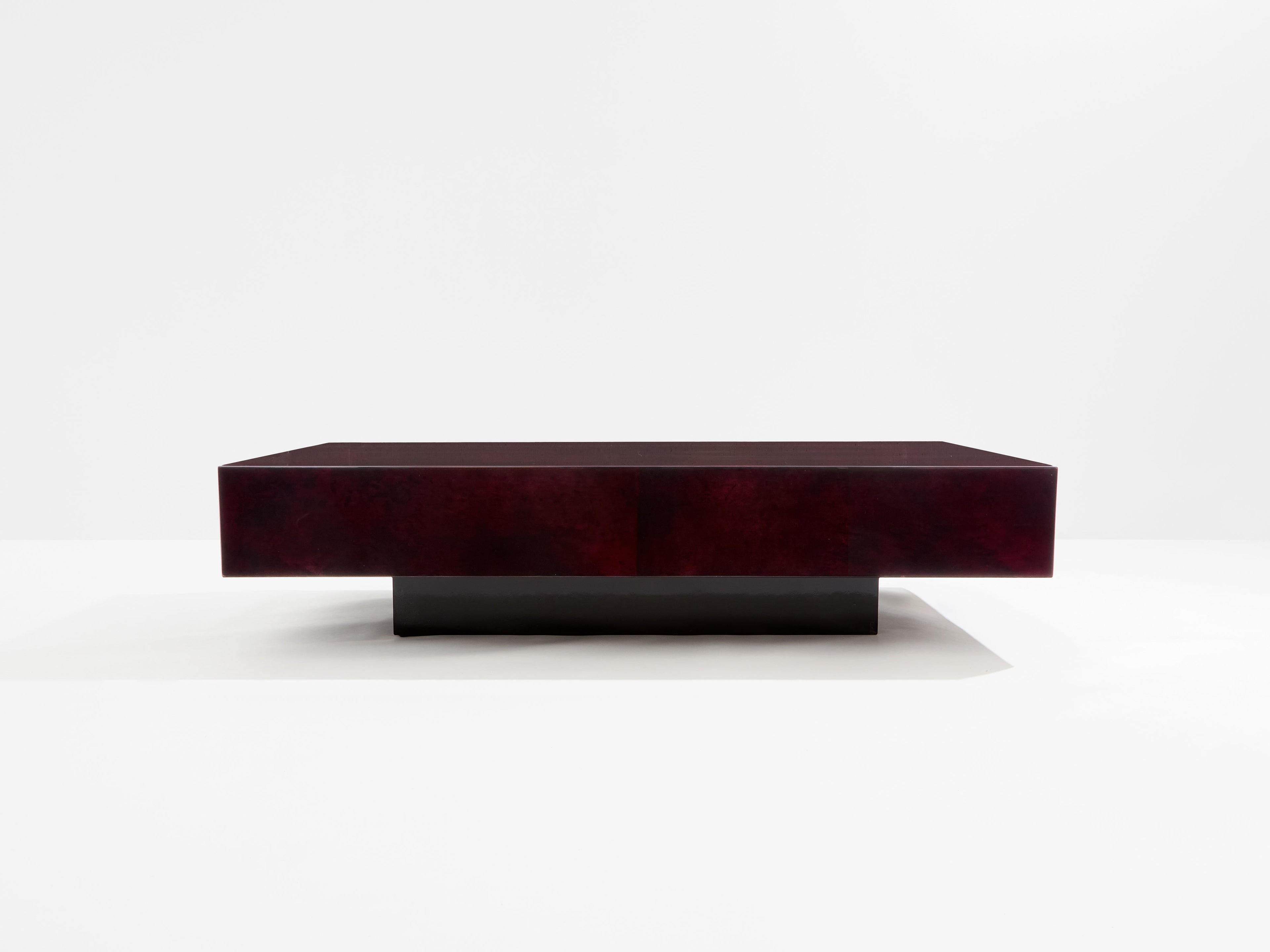 Burgundy red goatskin parchment coffee table by Aldo Tura 1960s