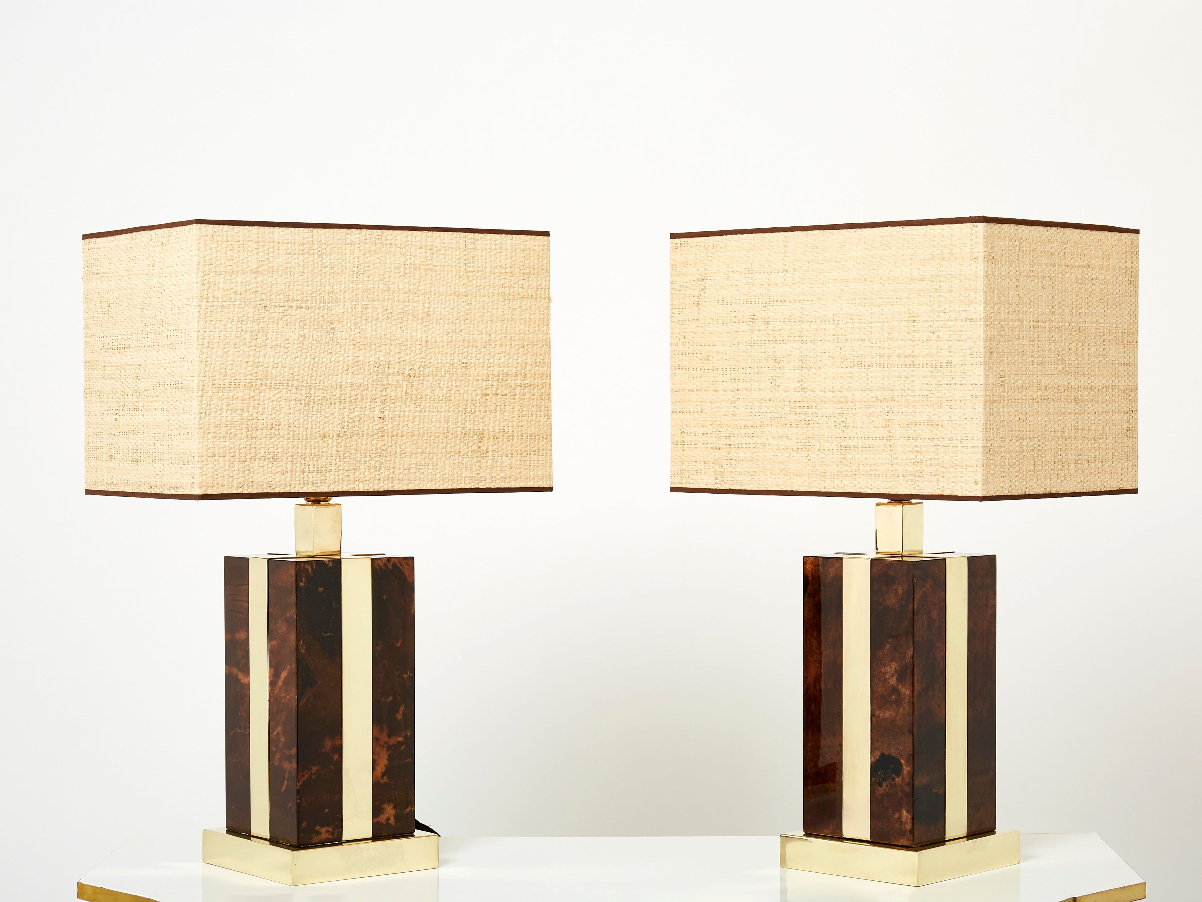 Pair of Italian Aldo Tura goatskin brass rattan table lamps 1970s