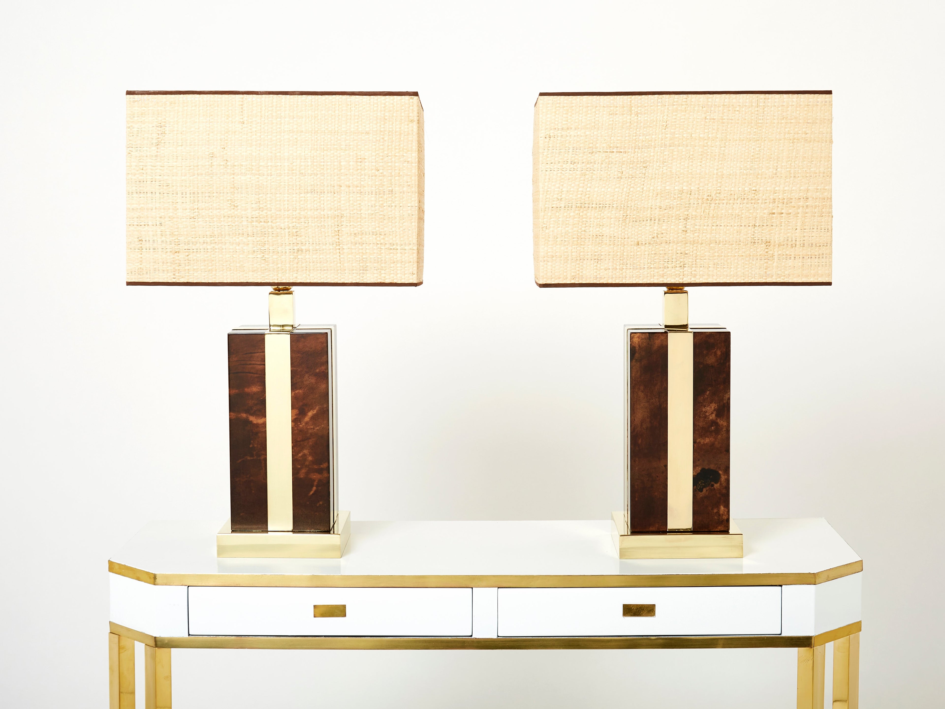 Pair of Italian Aldo Tura goatskin brass rattan table lamps 1970s