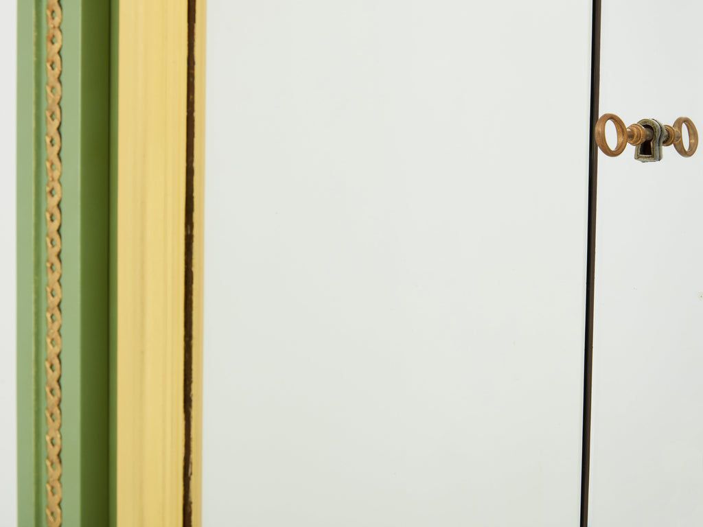 André Arbus pair of celadon green lacquered wardrobes gilt brass 1930