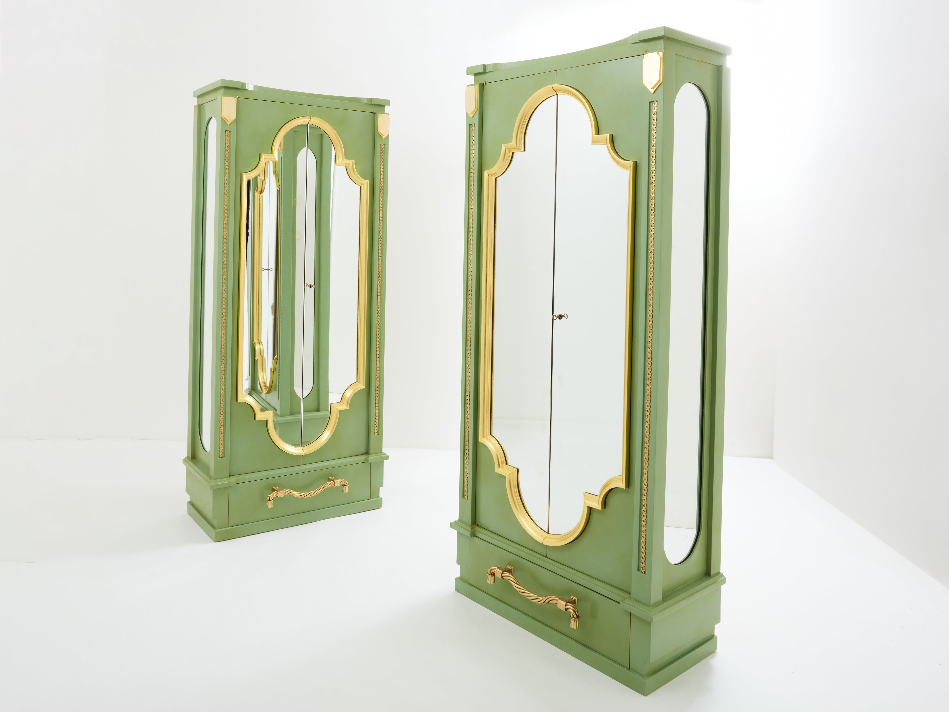 André Arbus pair of celadon green lacquered wardrobes gilt brass 1930
