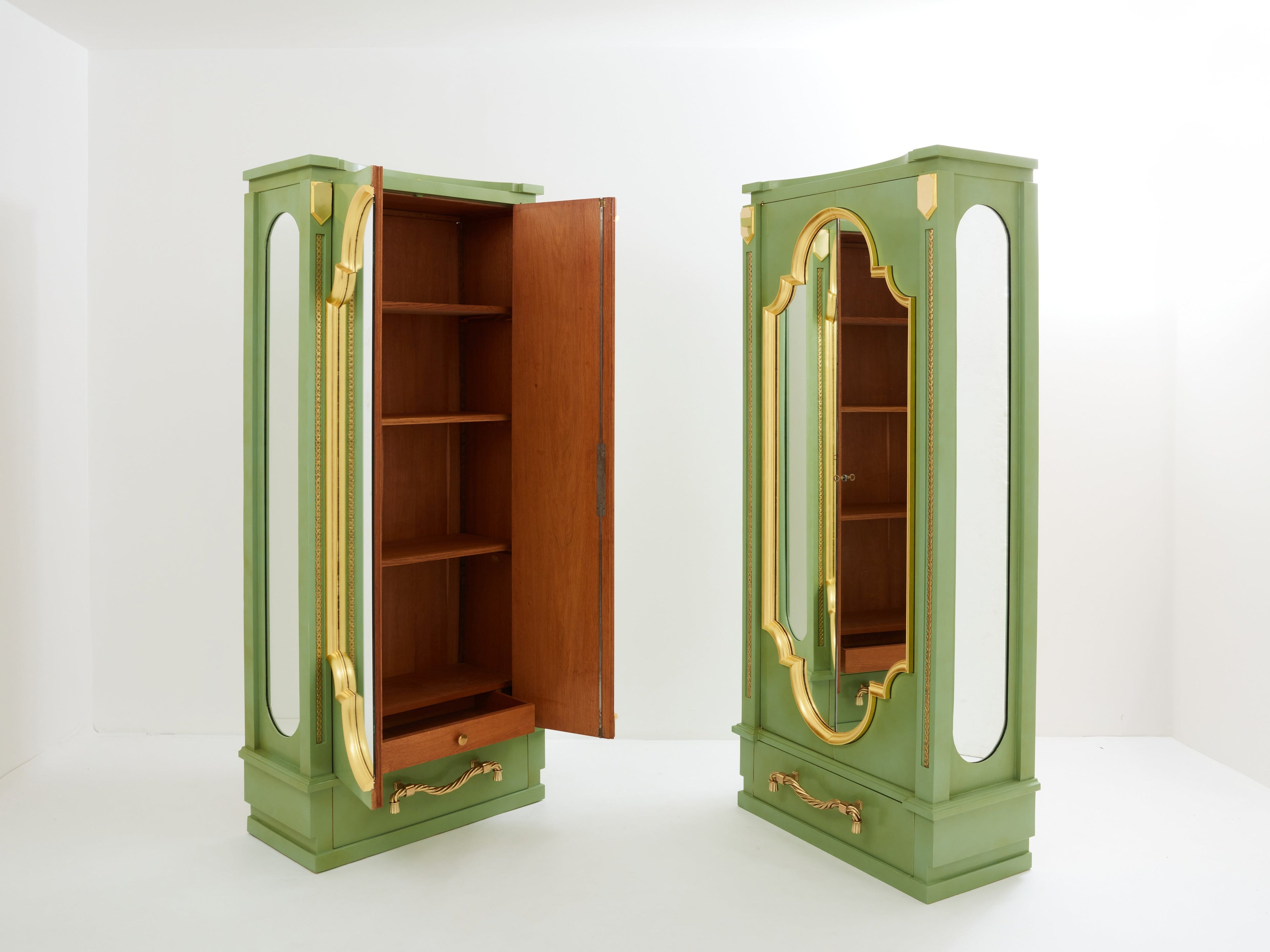André Arbus pair of celadon green lacquered wardrobes gilt brass 1930
