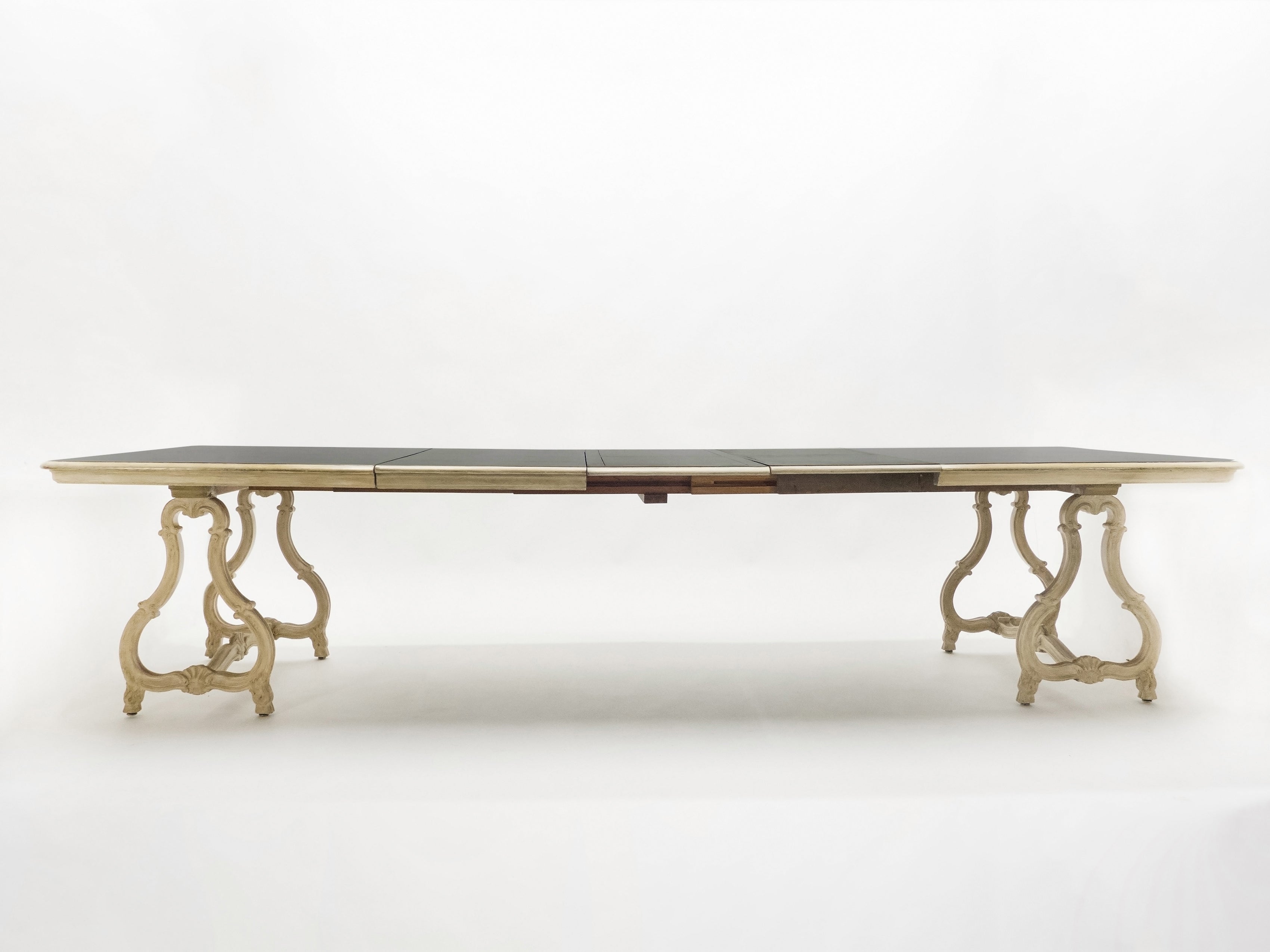Early XXth century stamped Maison Jansen Regence dining table