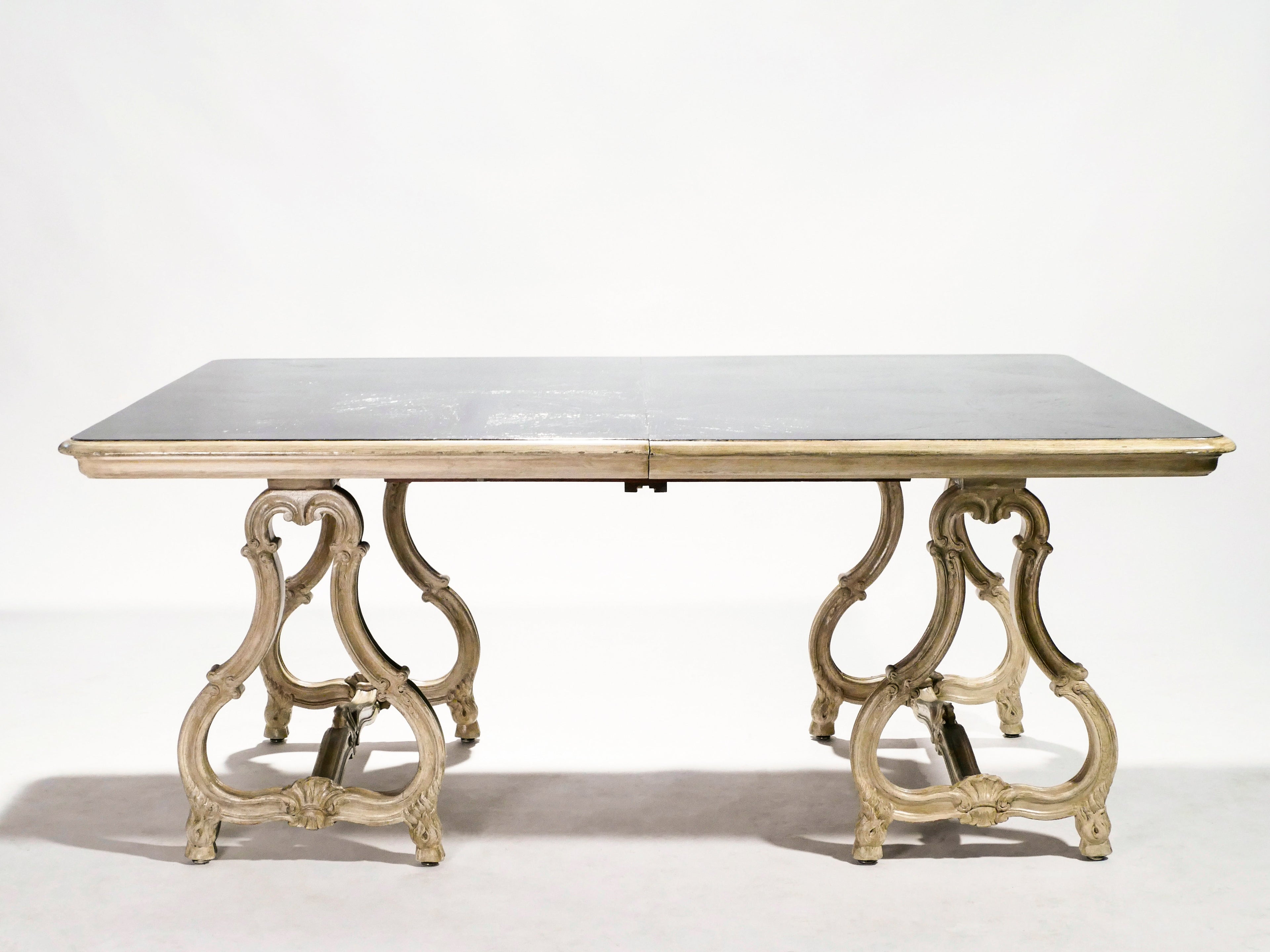 Early XXth century stamped Maison Jansen Regence dining table