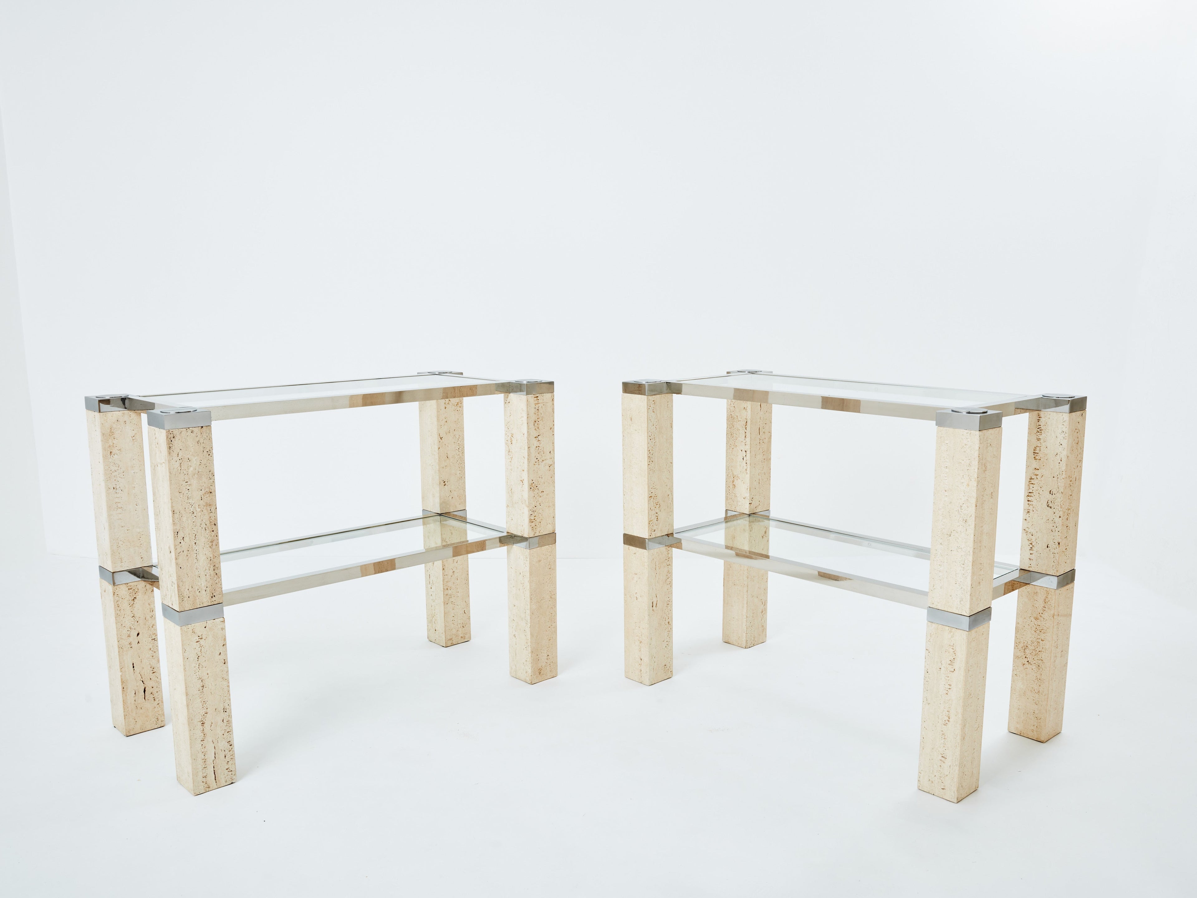 Pair of François Catroux chrome and travertine console tables 1973