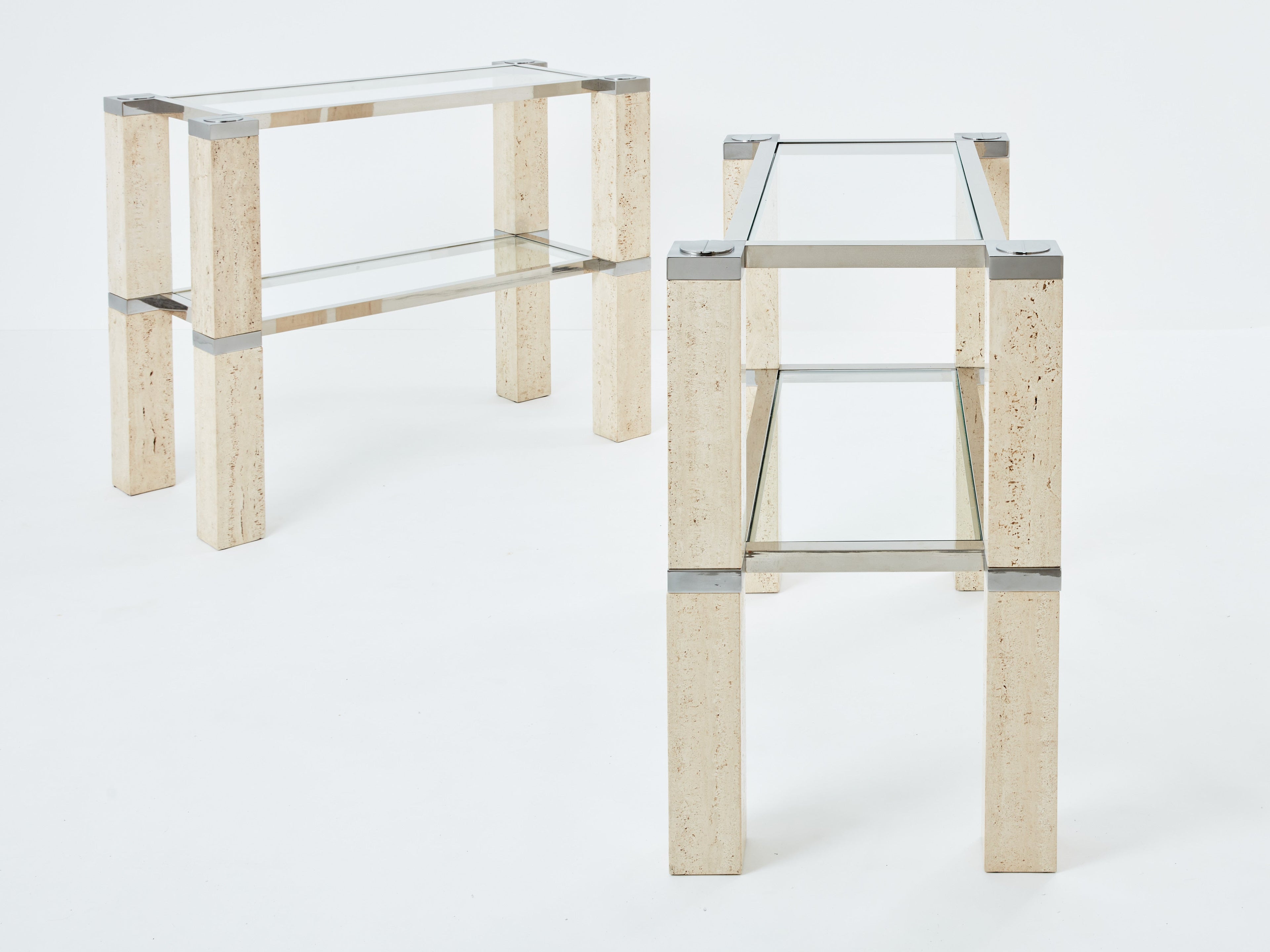 Pair of François Catroux chrome and travertine console tables 1973