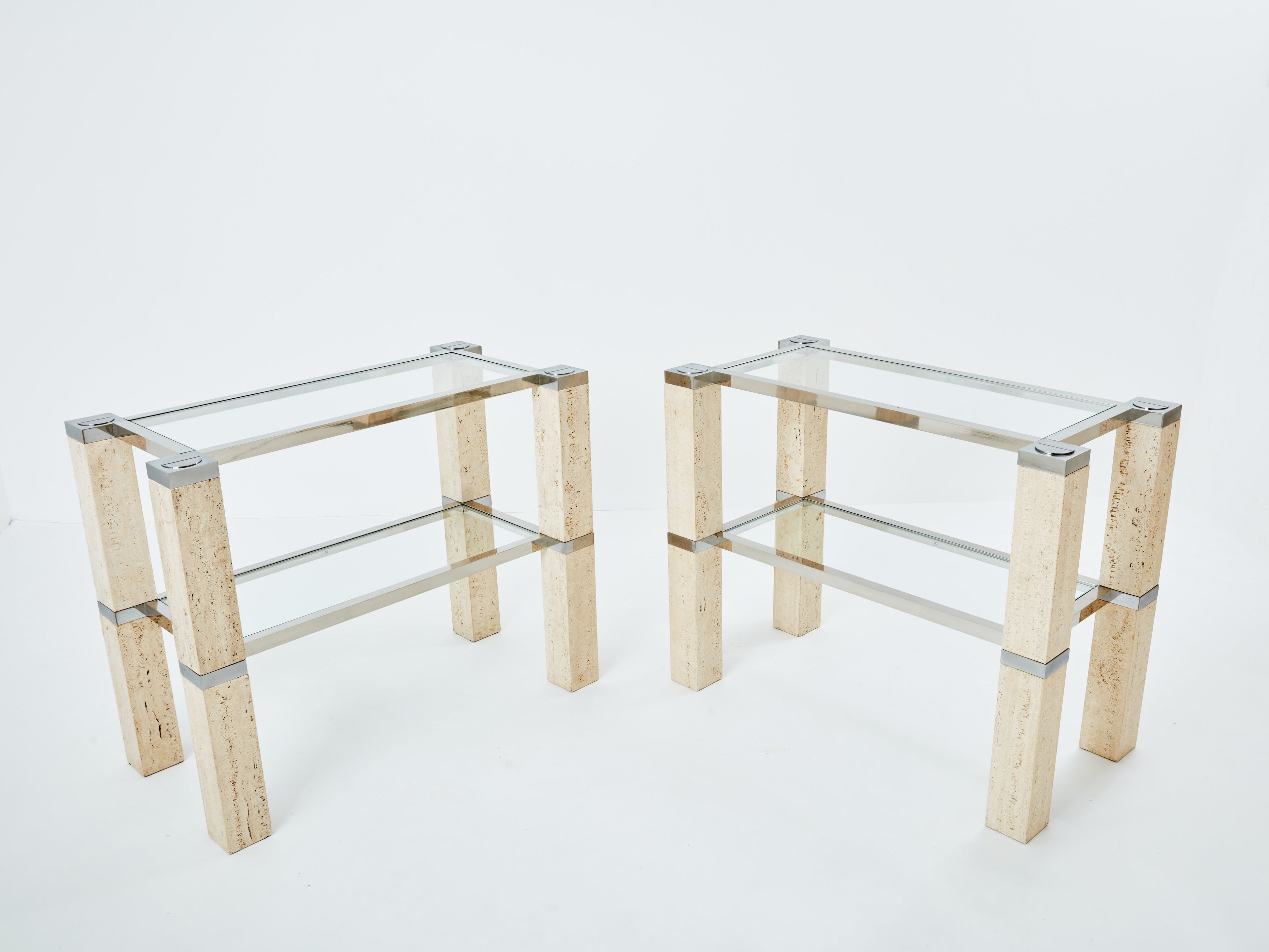 Pair of François Catroux chrome and travertine console tables 1973