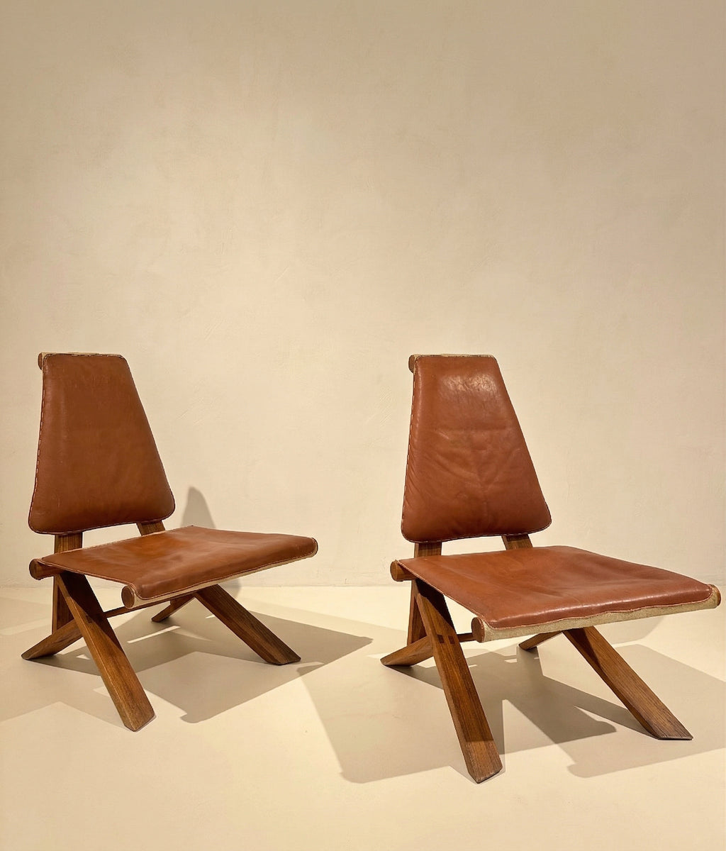 Rare pair of S46 easy chairs by Pierre Chapo