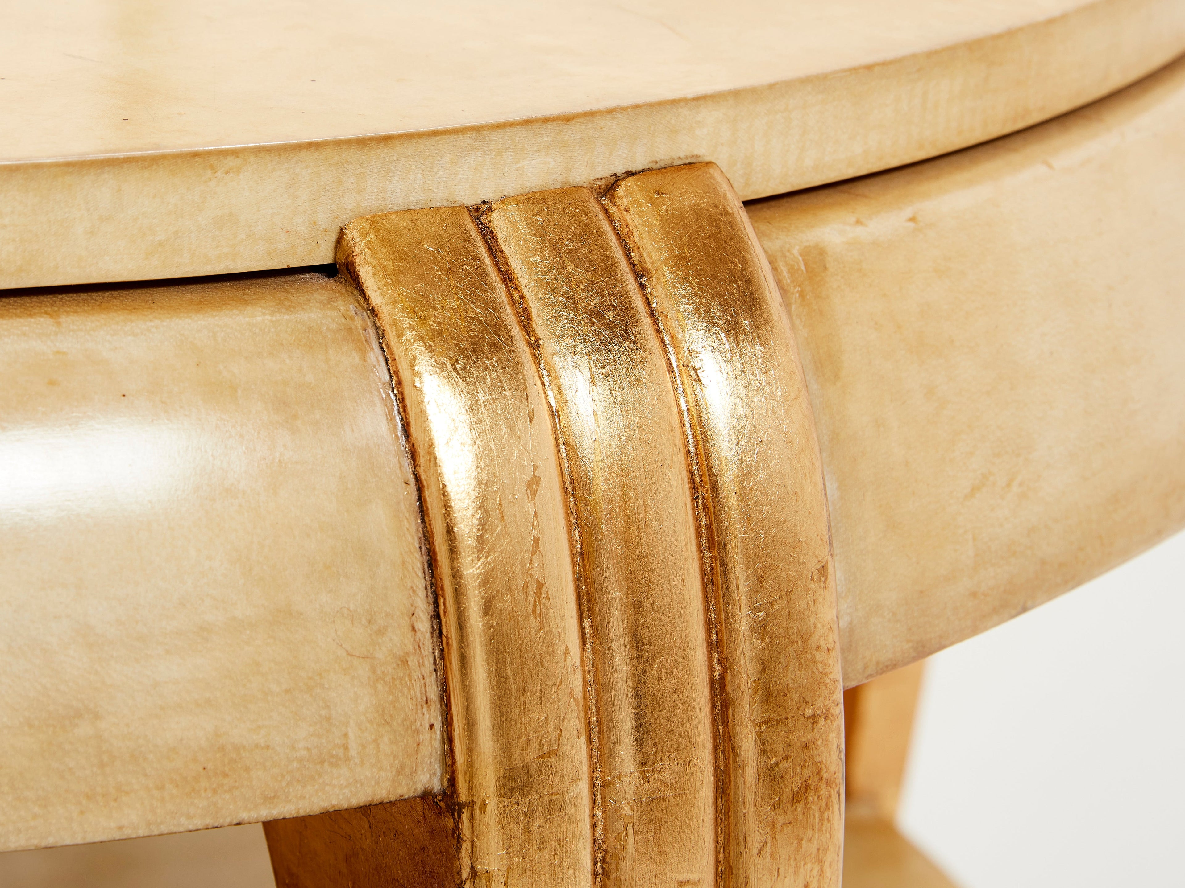 Gilded wood and parchment center table attr. Maurice Dufrène. 1930s