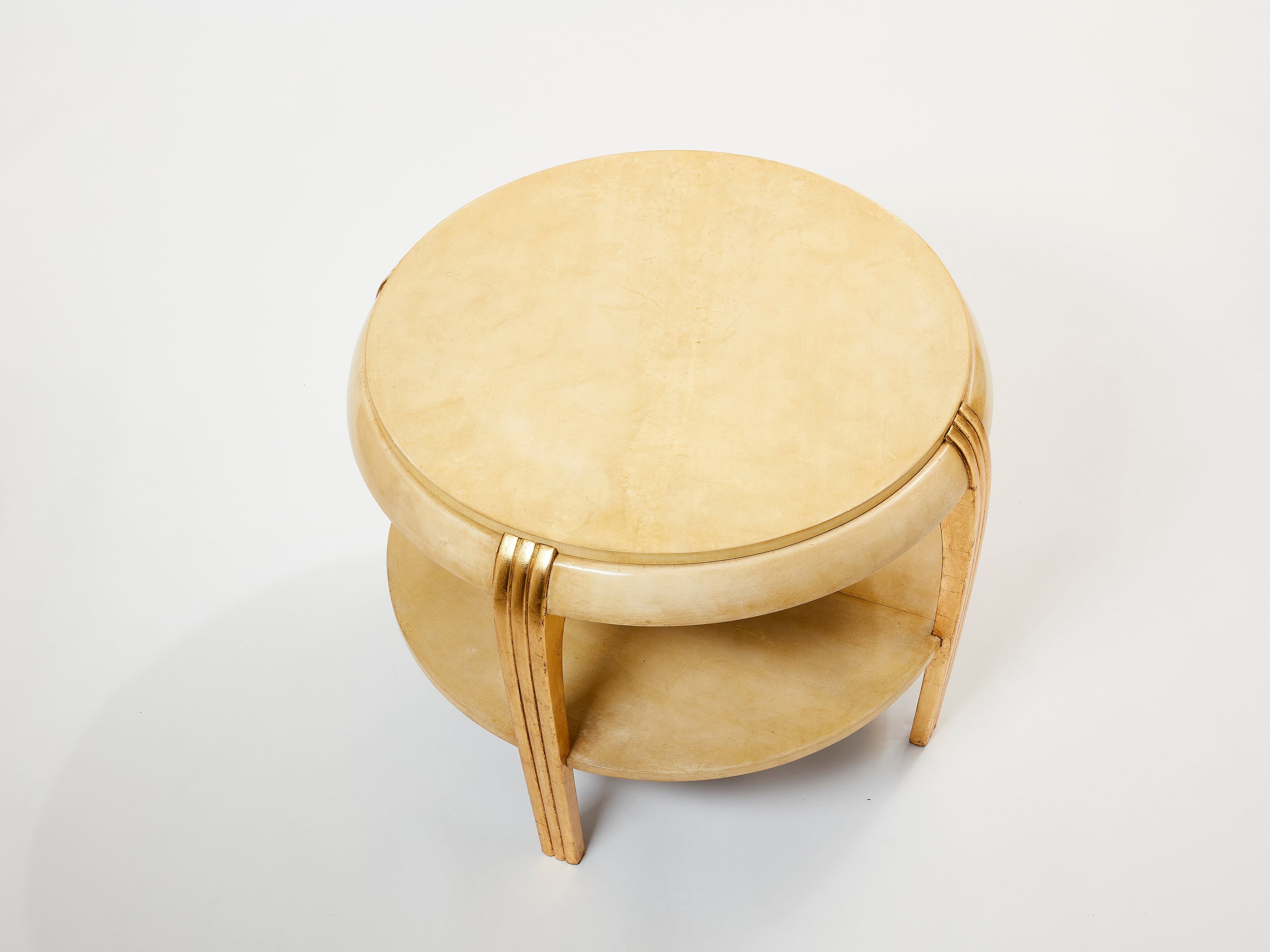 Gilded wood and parchment center table attr. Maurice Dufrène. 1930s