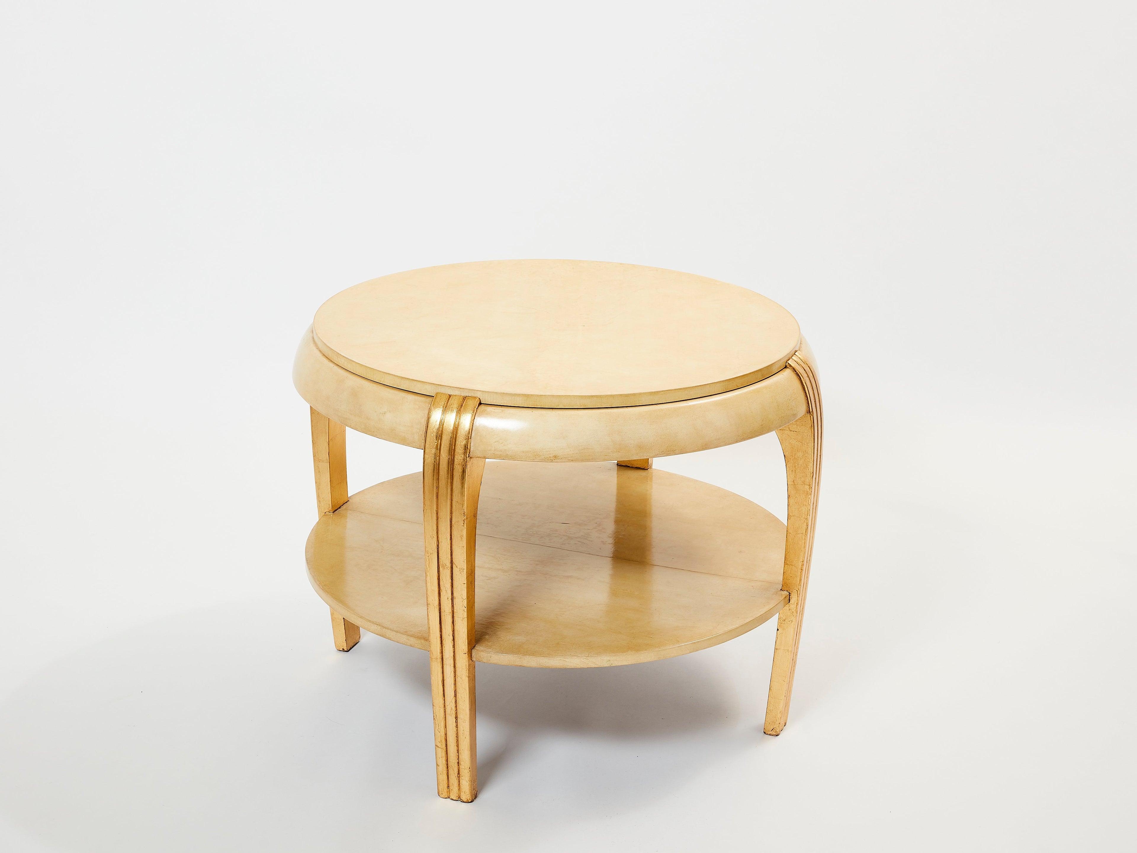Gilded wood and parchment center table attr. Maurice Dufrène. 1930s