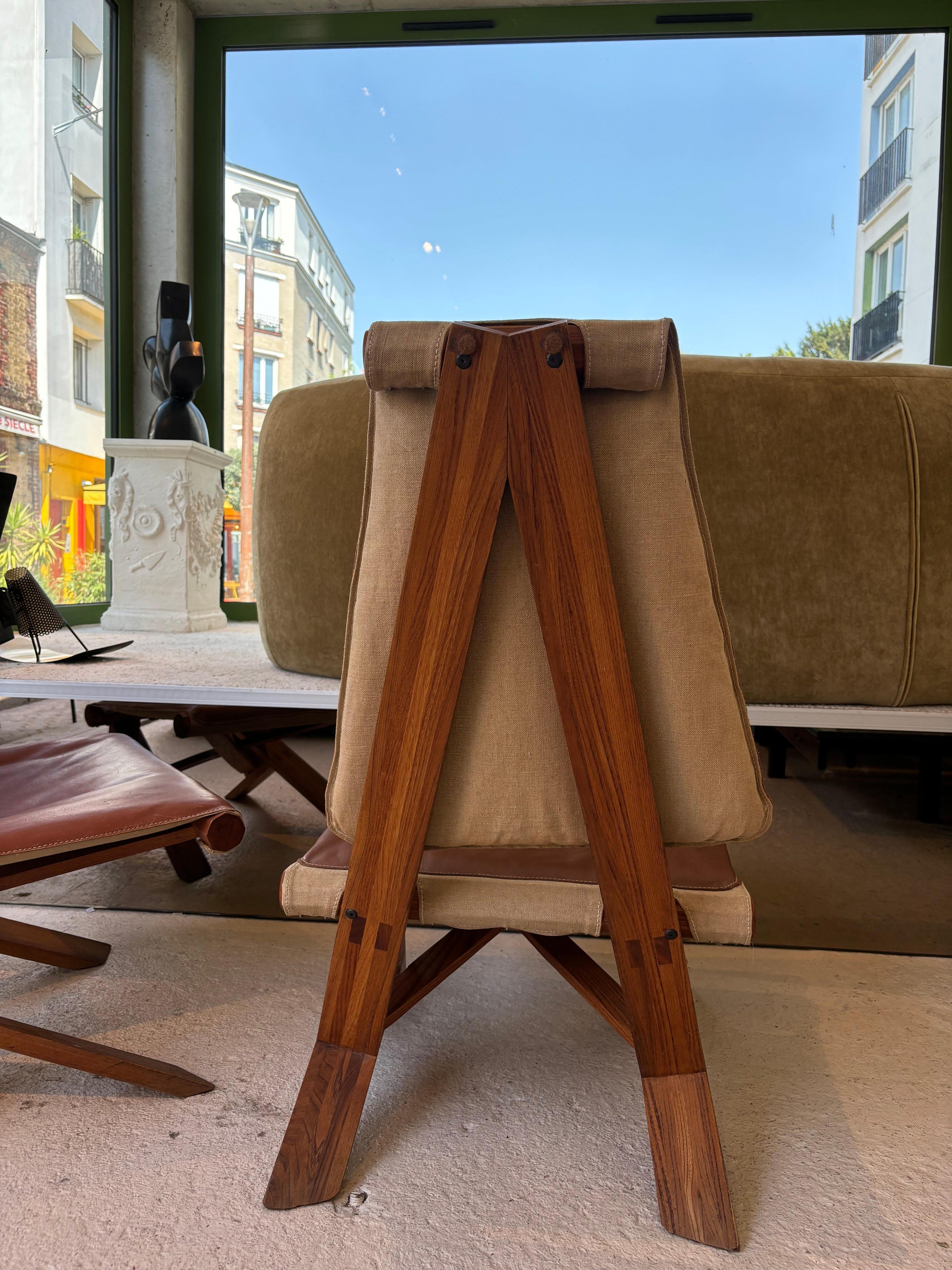 Rare pair of S46 easy chairs by Pierre Chapo
