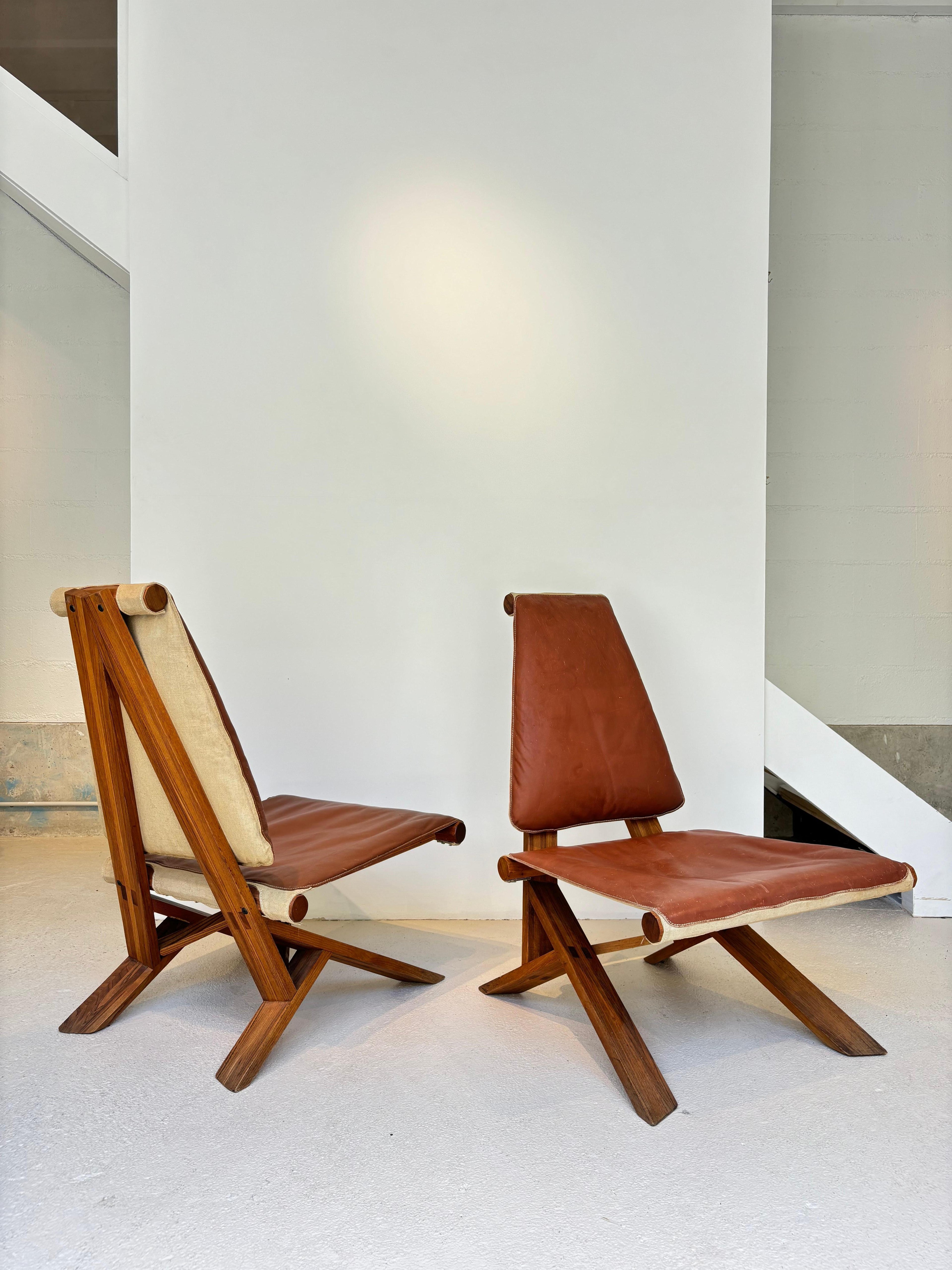 Rare pair of S46 easy chairs by Pierre Chapo