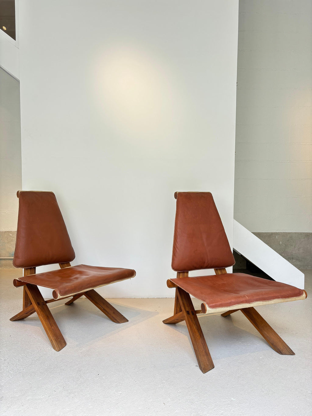 Rare pair of S46 easy chairs by Pierre Chapo