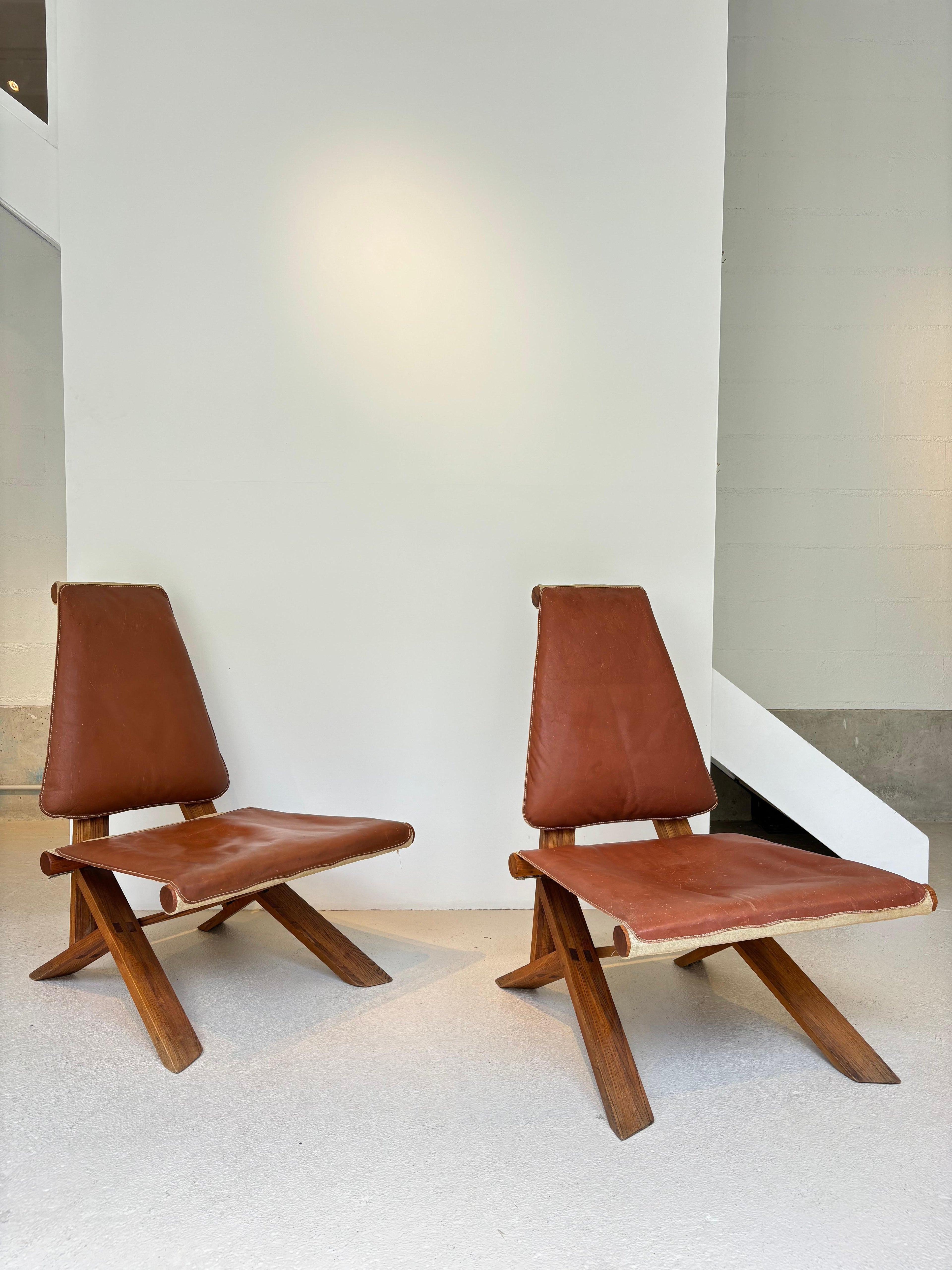 Rare pair of S46 easy chairs by Pierre Chapo