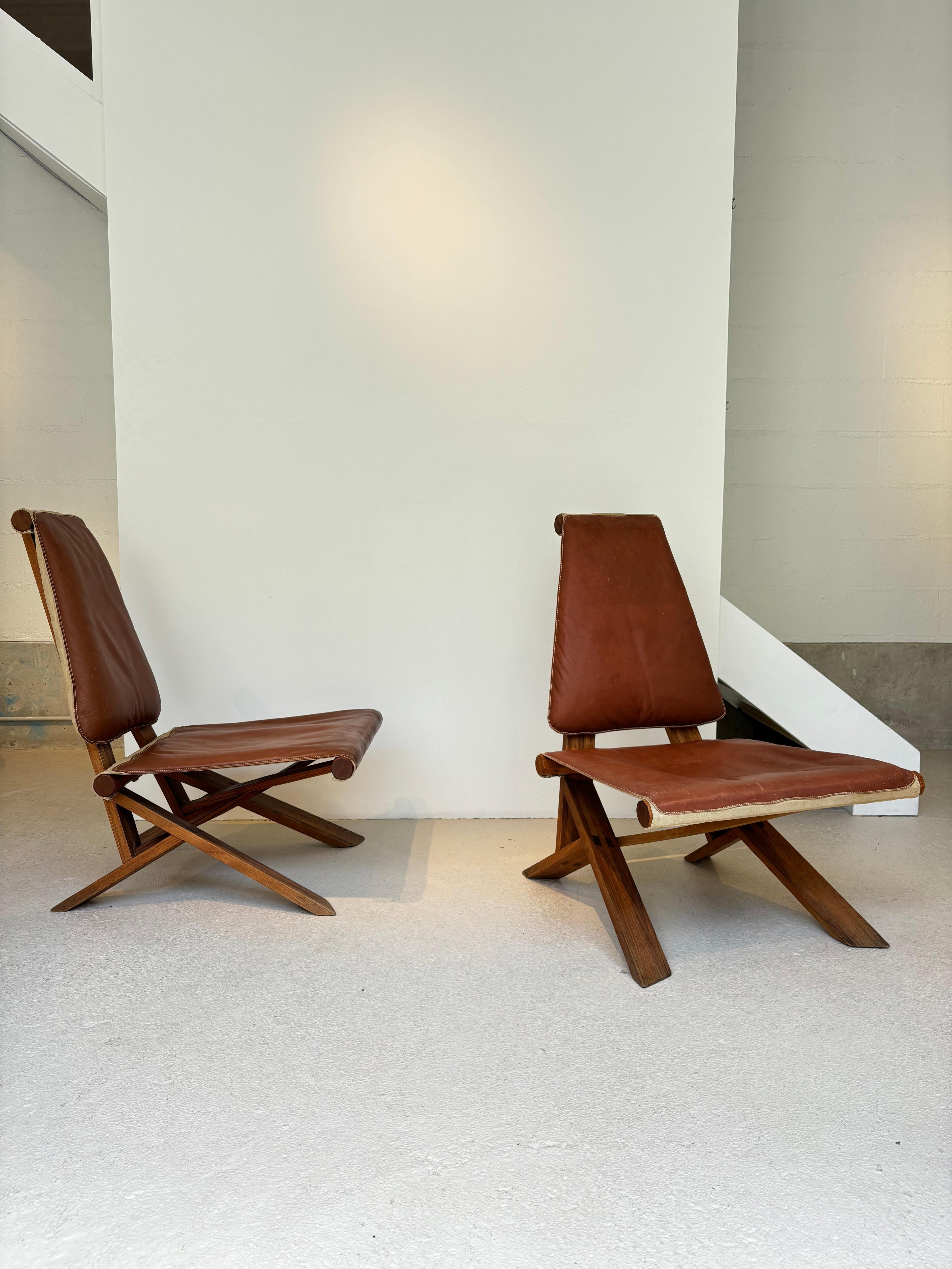 Rare pair of S46 easy chairs by Pierre Chapo