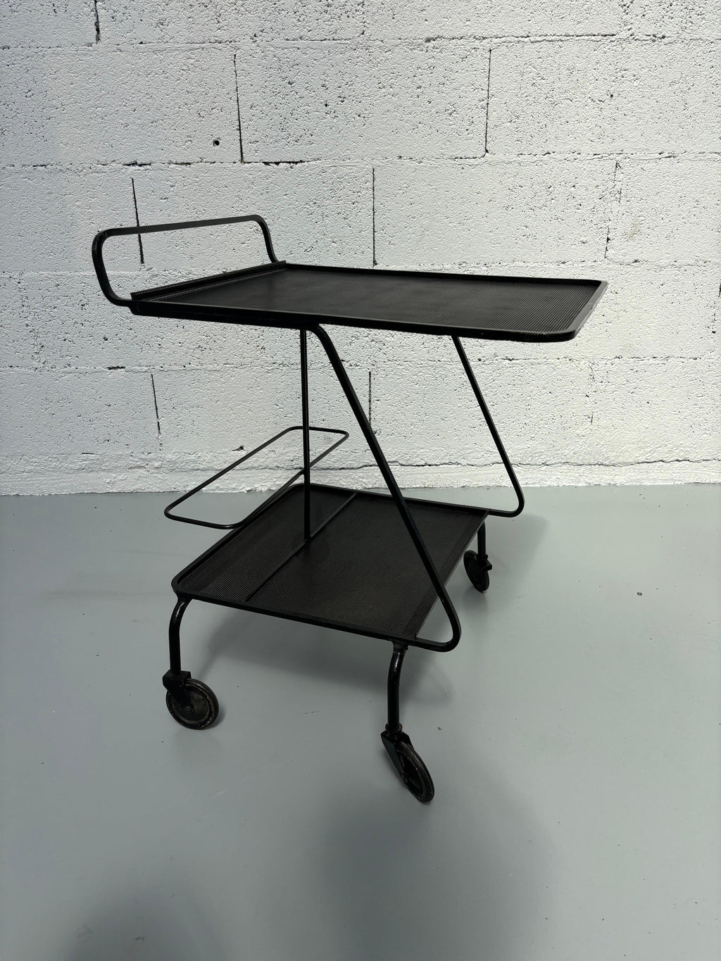 Serving table by Mathieu Matégot
