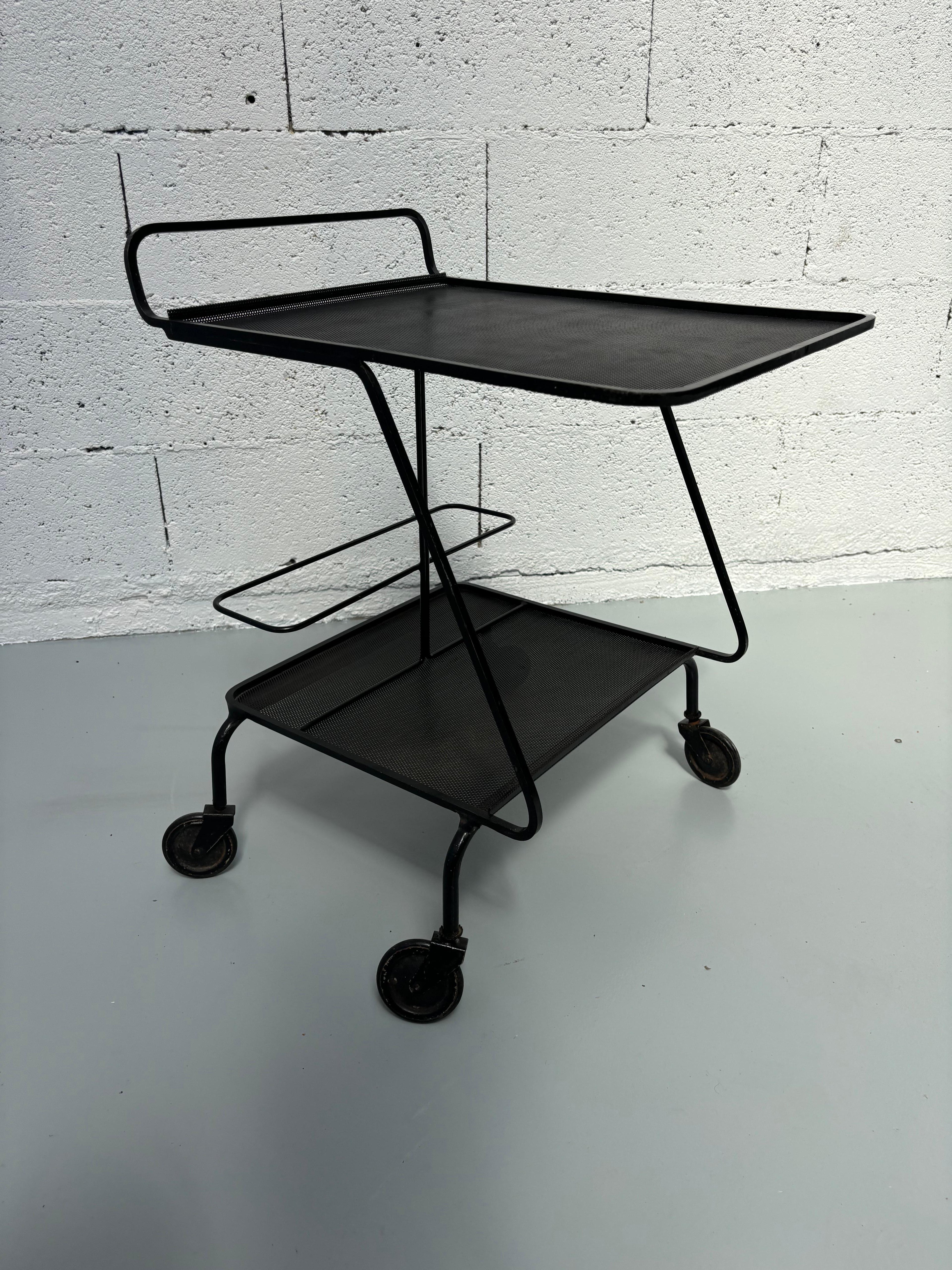 Serving table by Mathieu Matégot