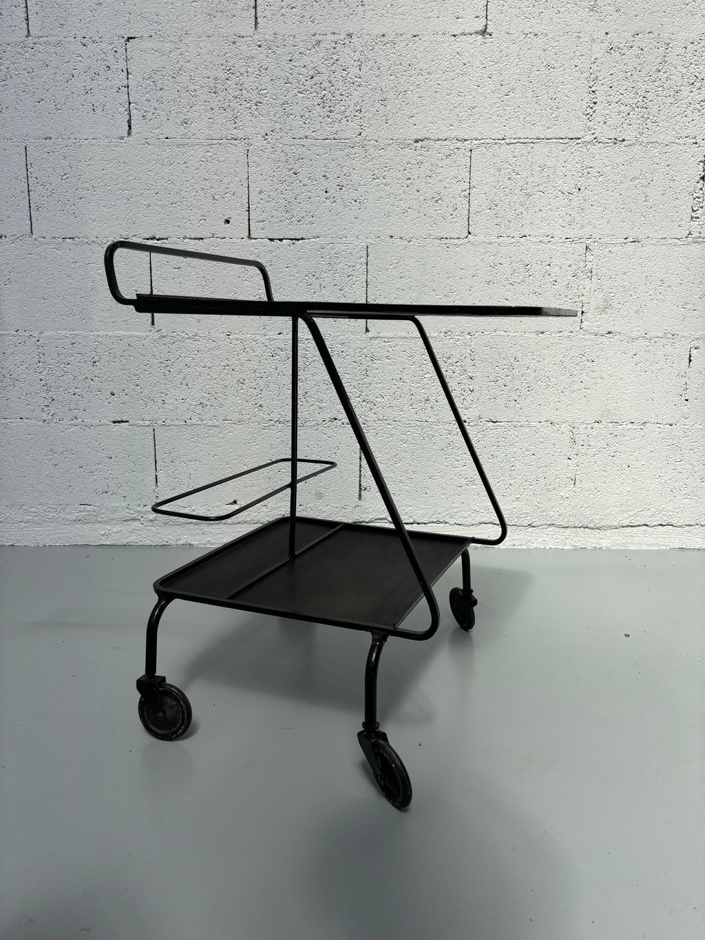 Serving table by Mathieu Matégot
