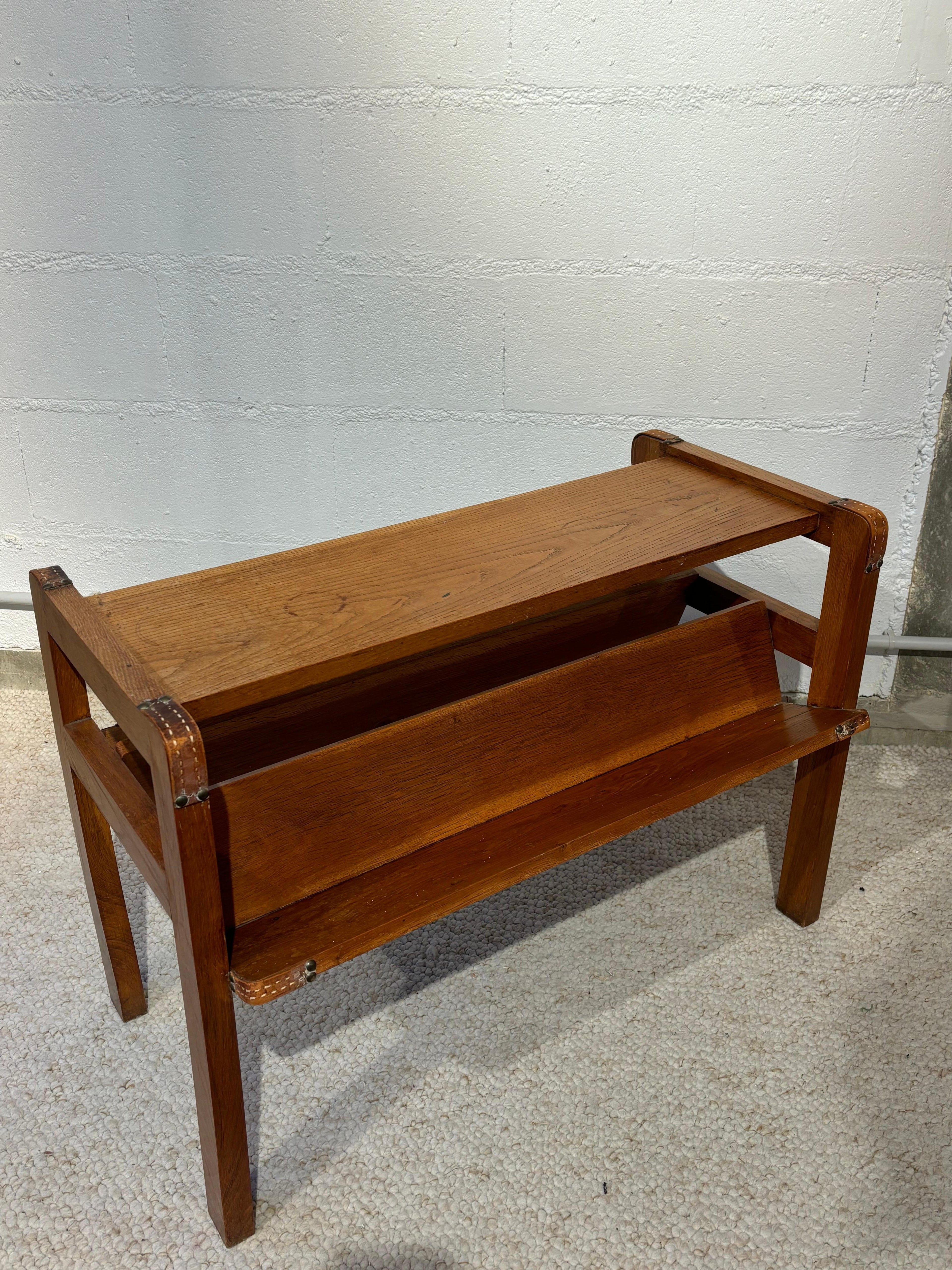 Side table with rack by Jacques Adnet