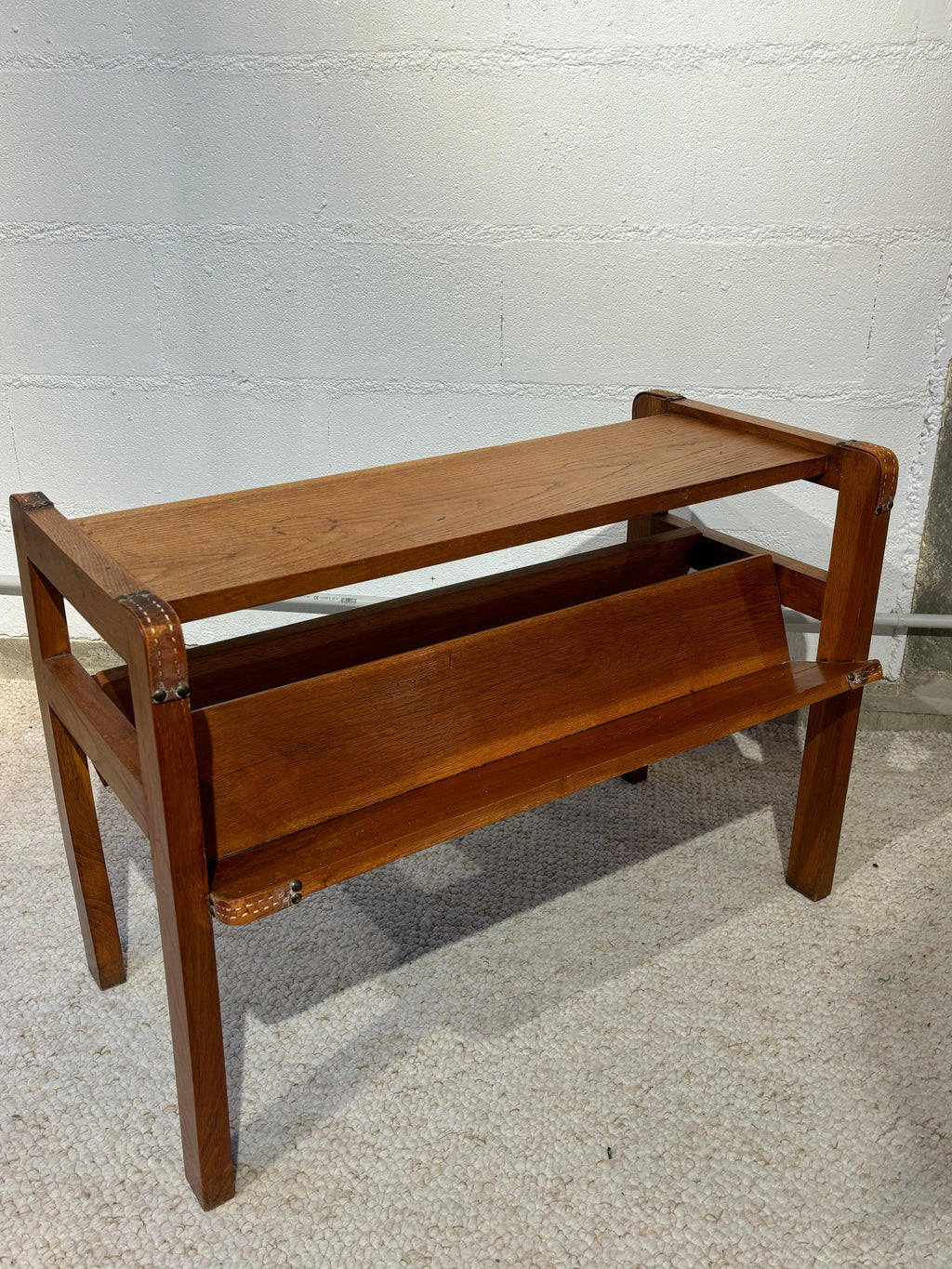 Side table with rack by Jacques Adnet