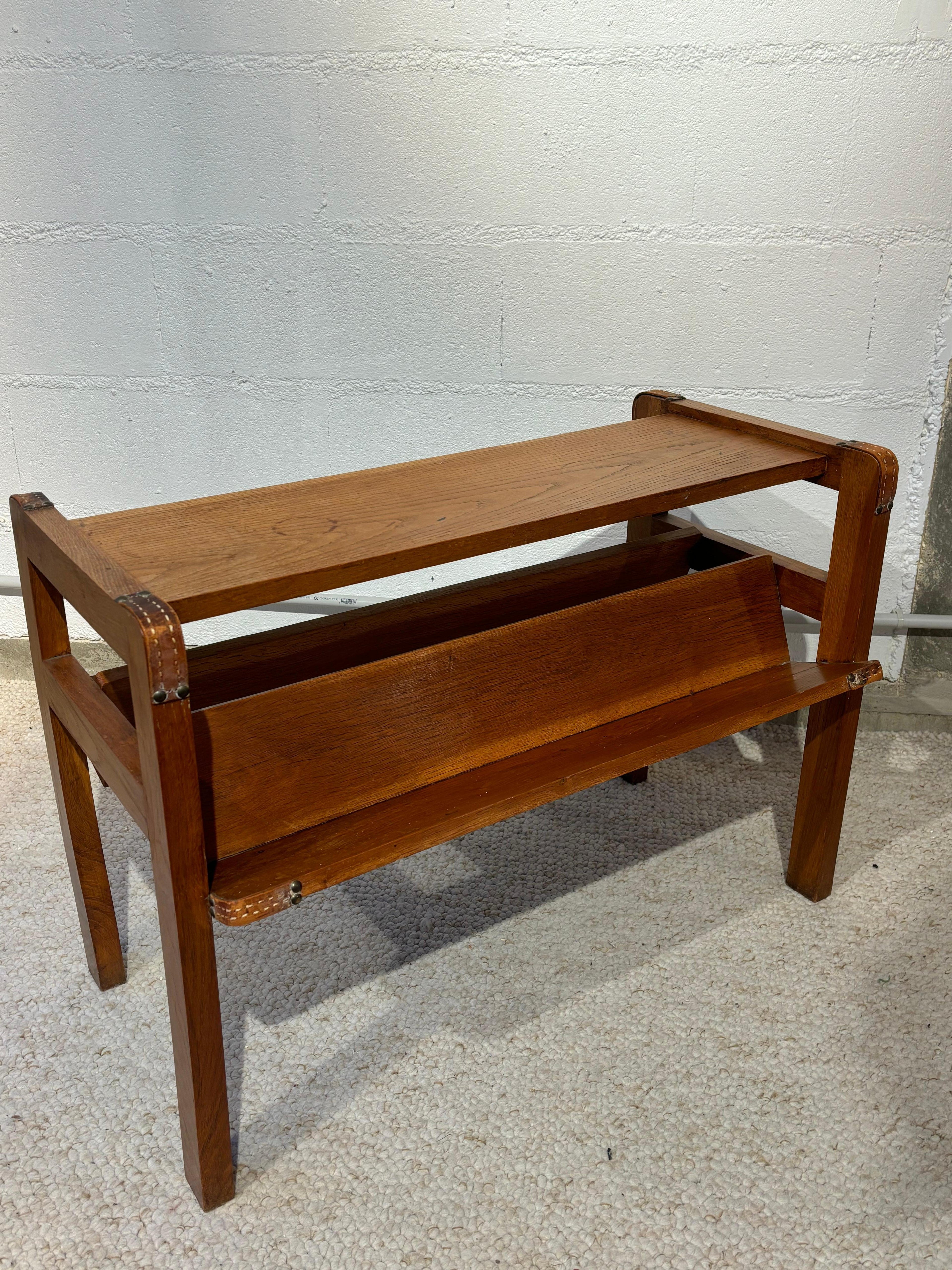 Side table with rack by Jacques Adnet