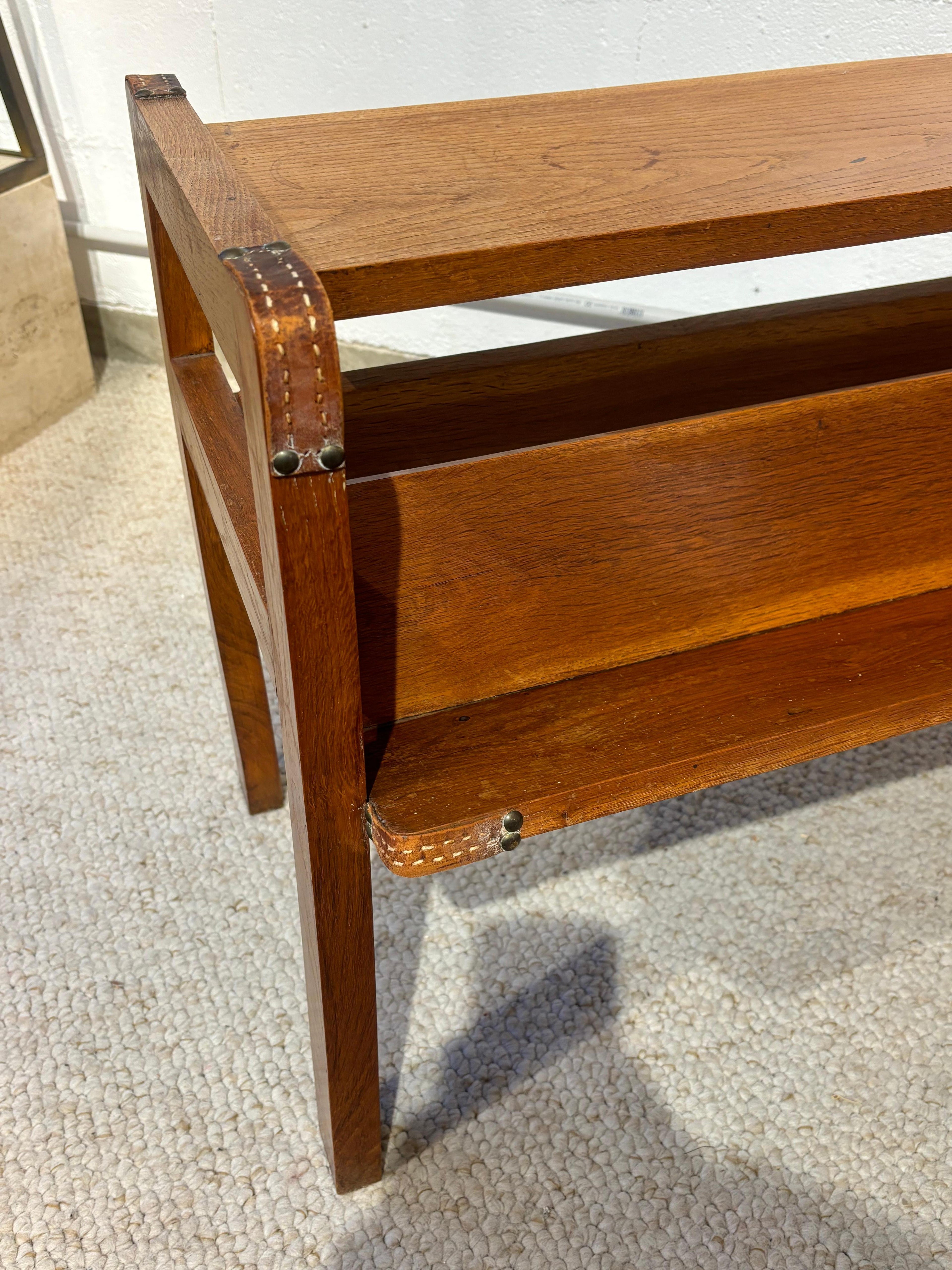 Side table with rack by Jacques Adnet