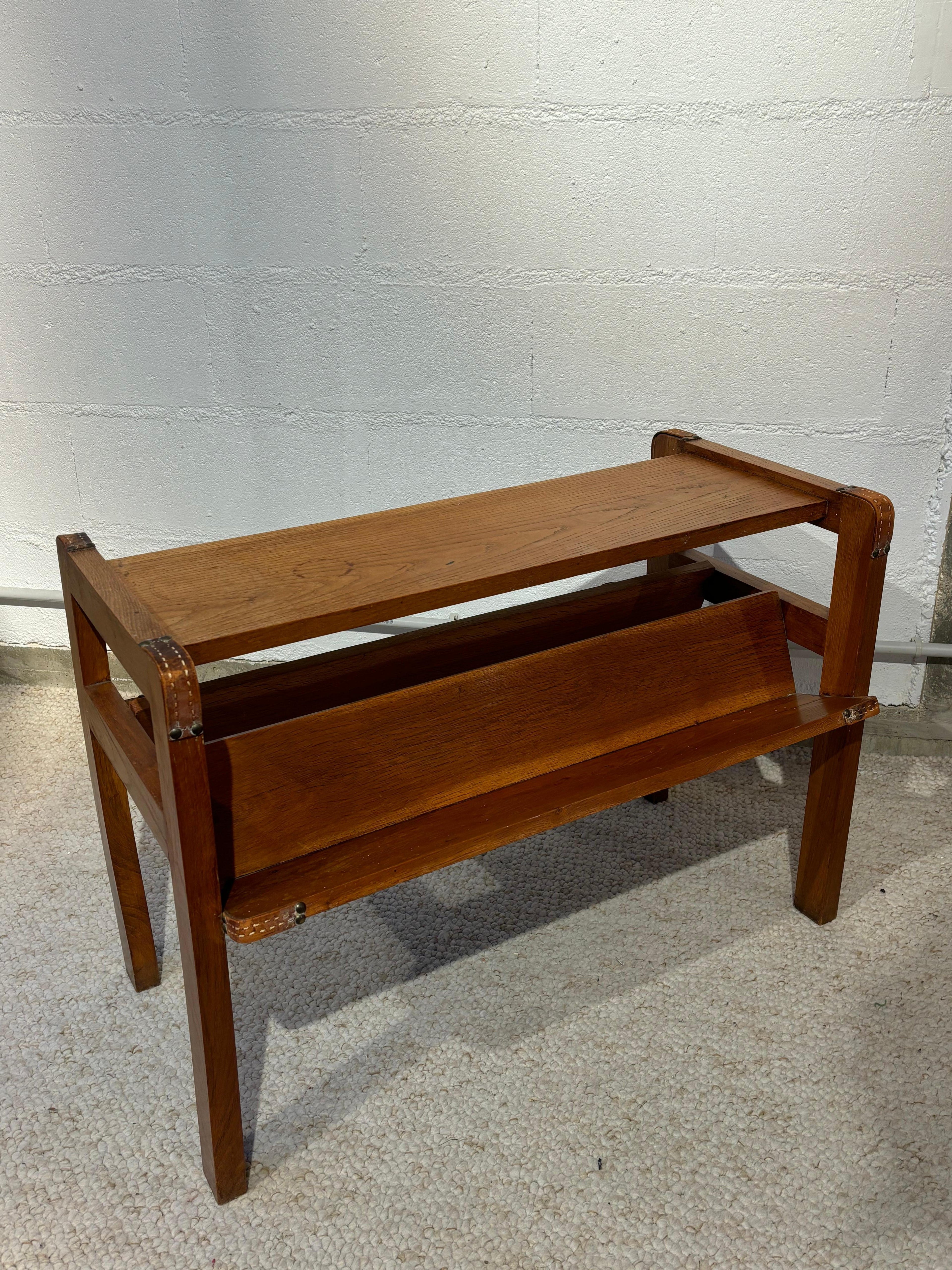 Side table with rack by Jacques Adnet
