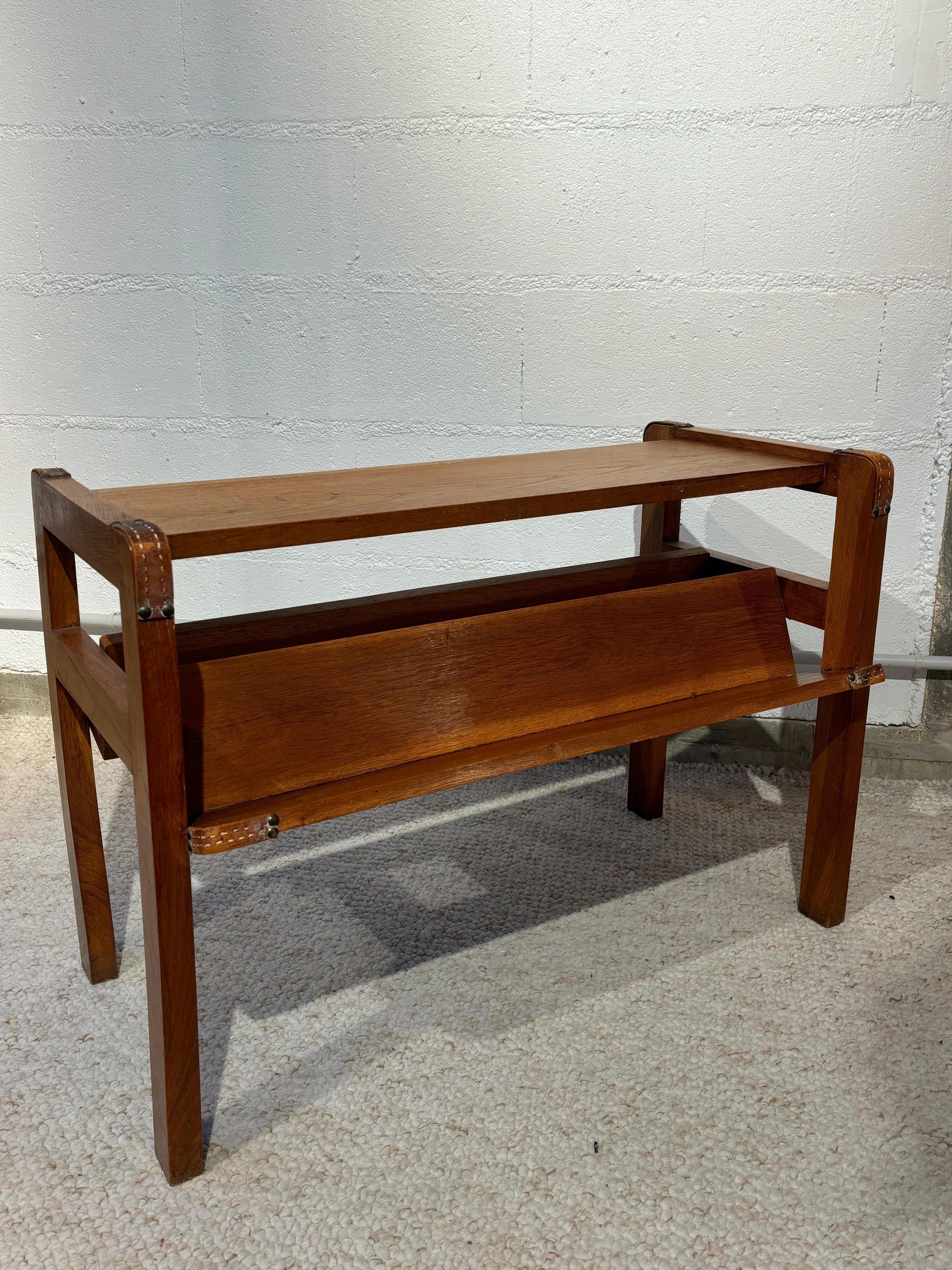 Side table with rack by Jacques Adnet