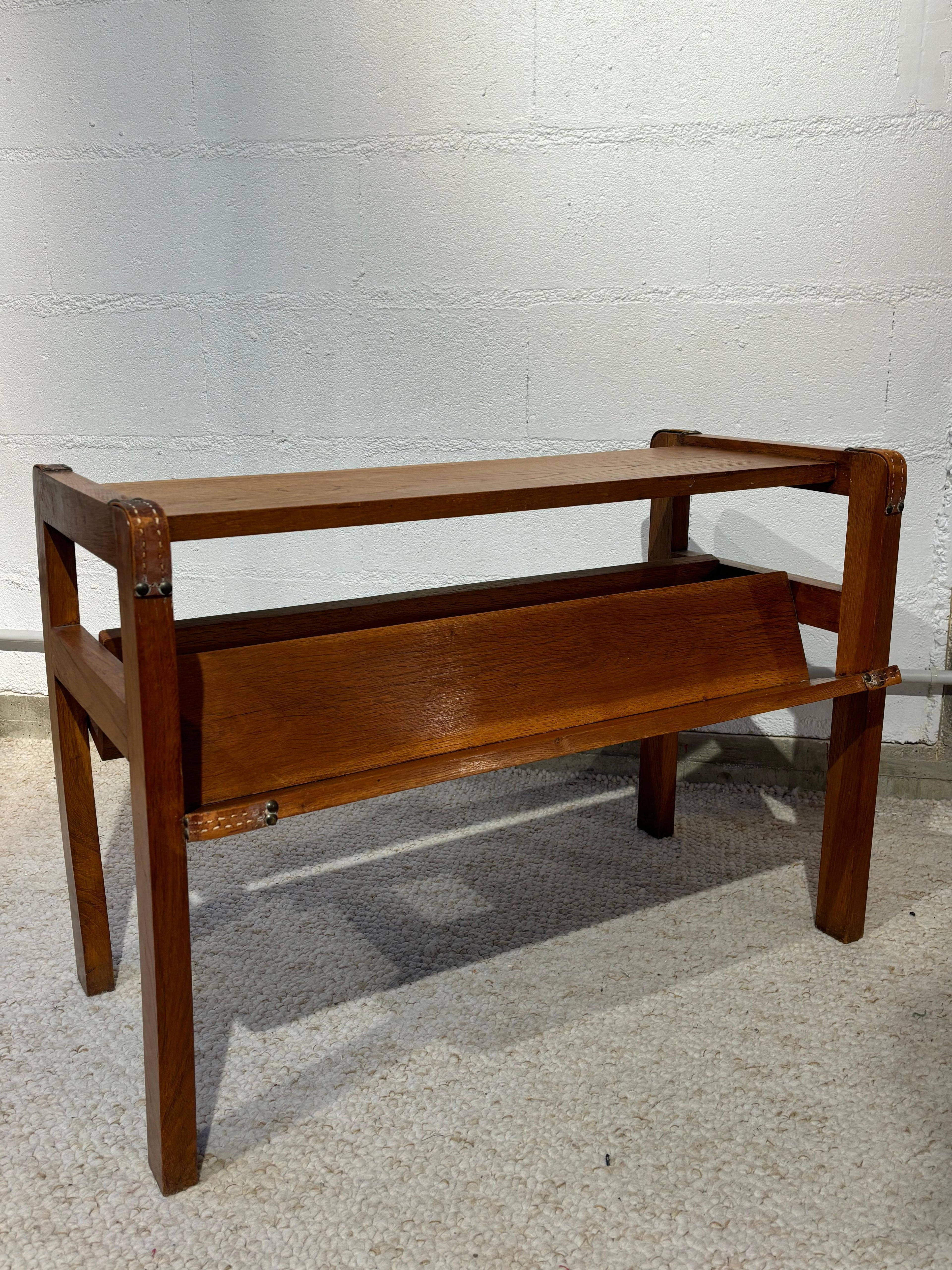 Side table with rack by Jacques Adnet