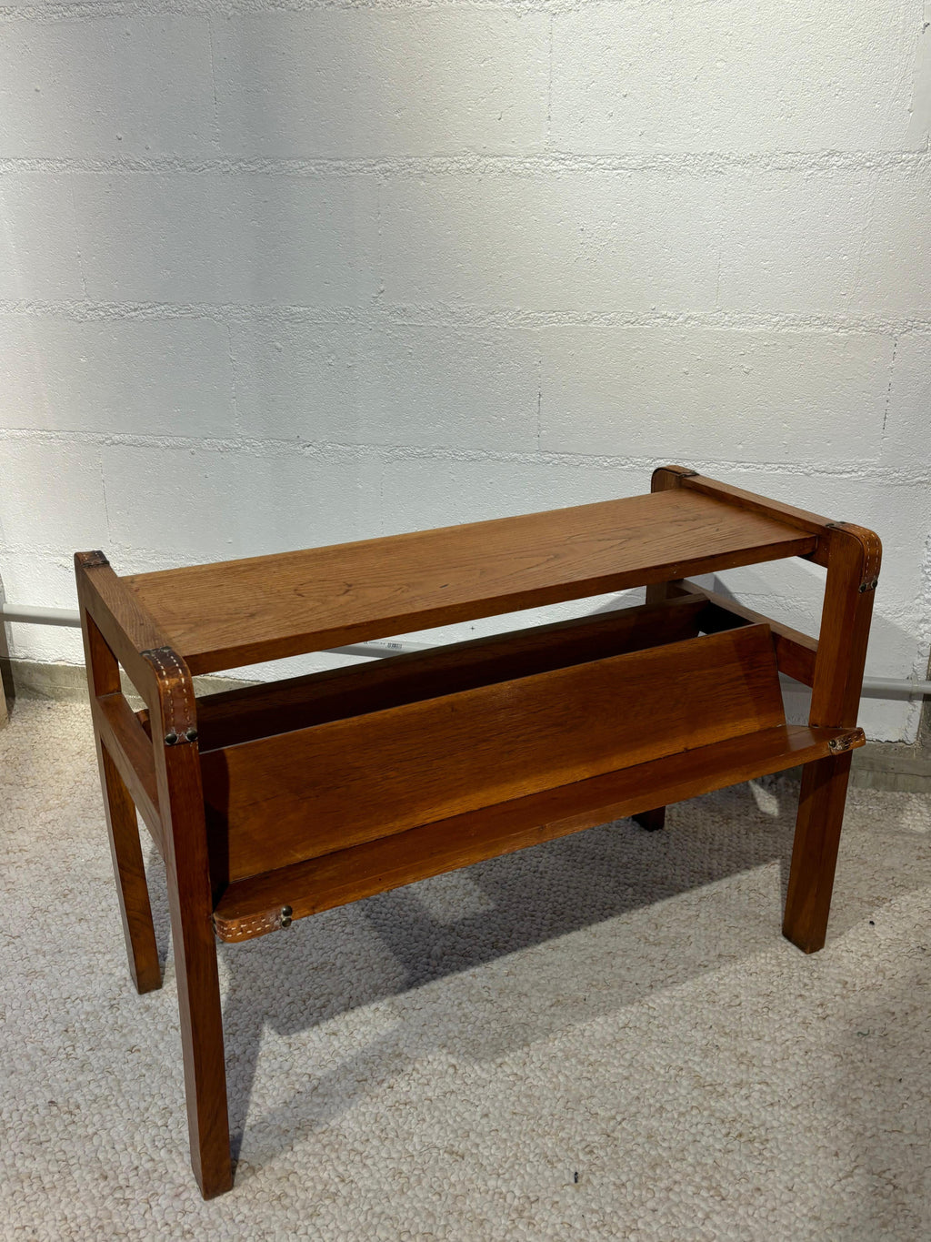 Side table with rack by Jacques Adnet