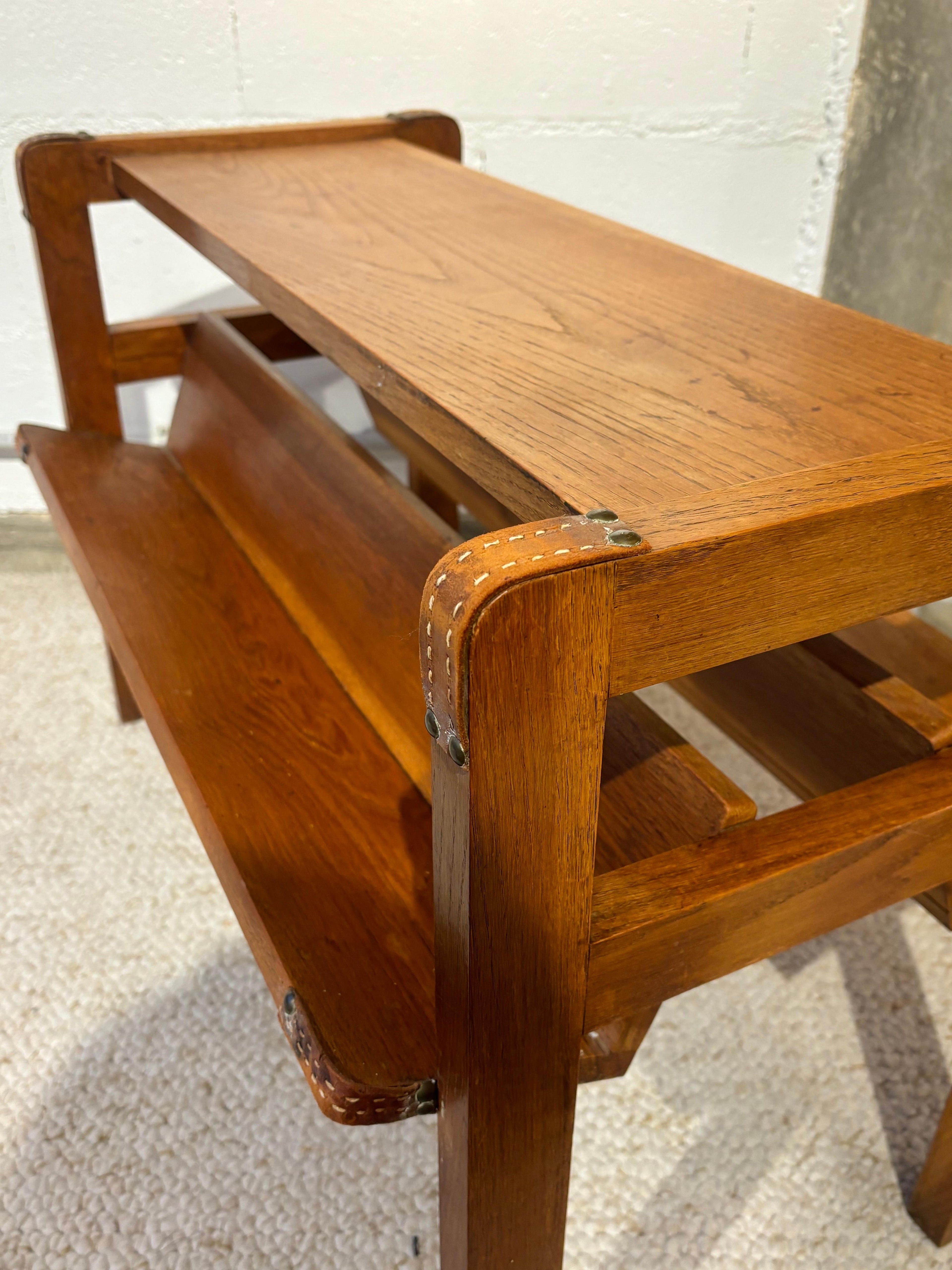 Side table with rack by Jacques Adnet