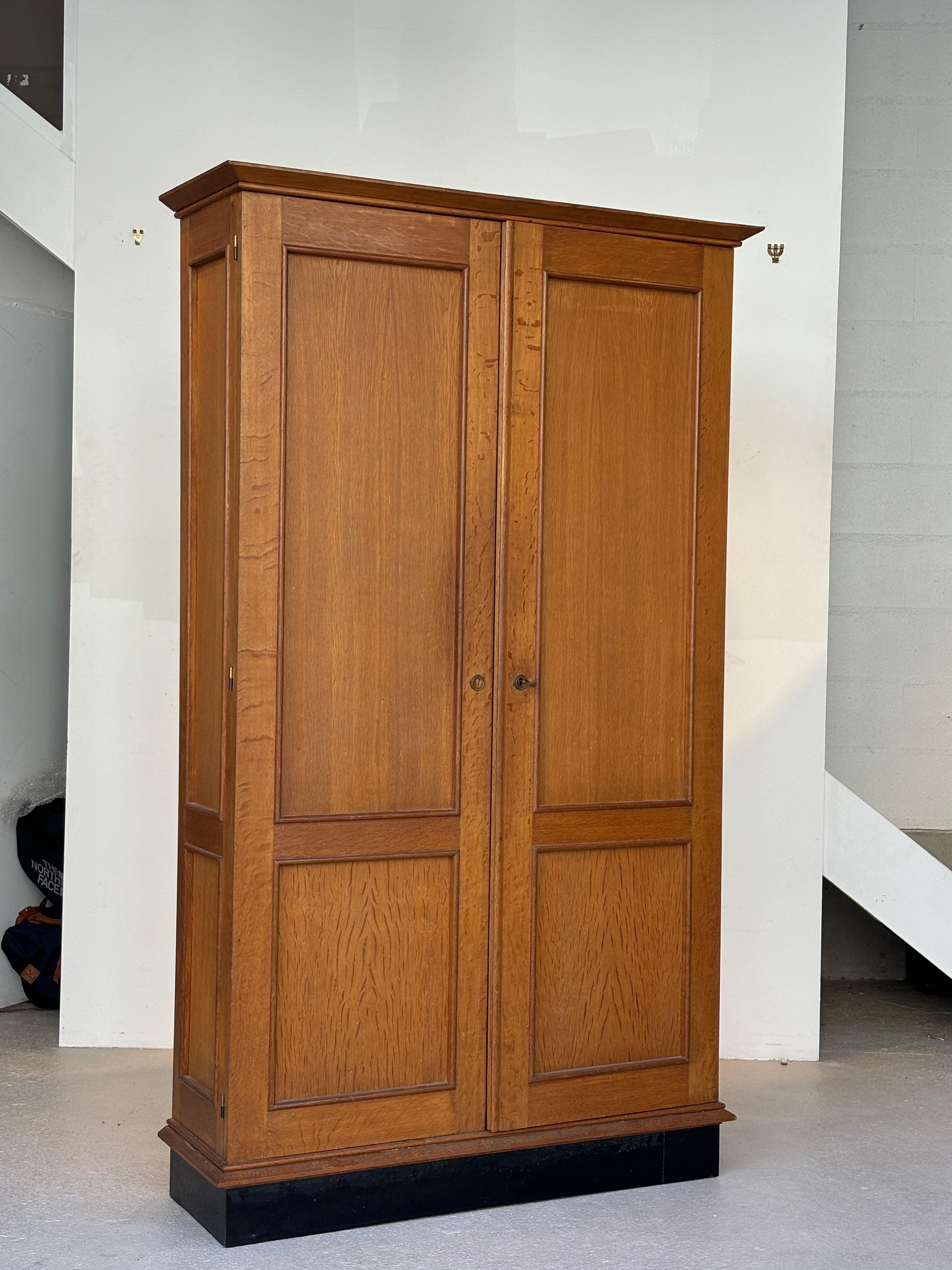 Jacques Adnet wardrobes in oak and formica circa 1950