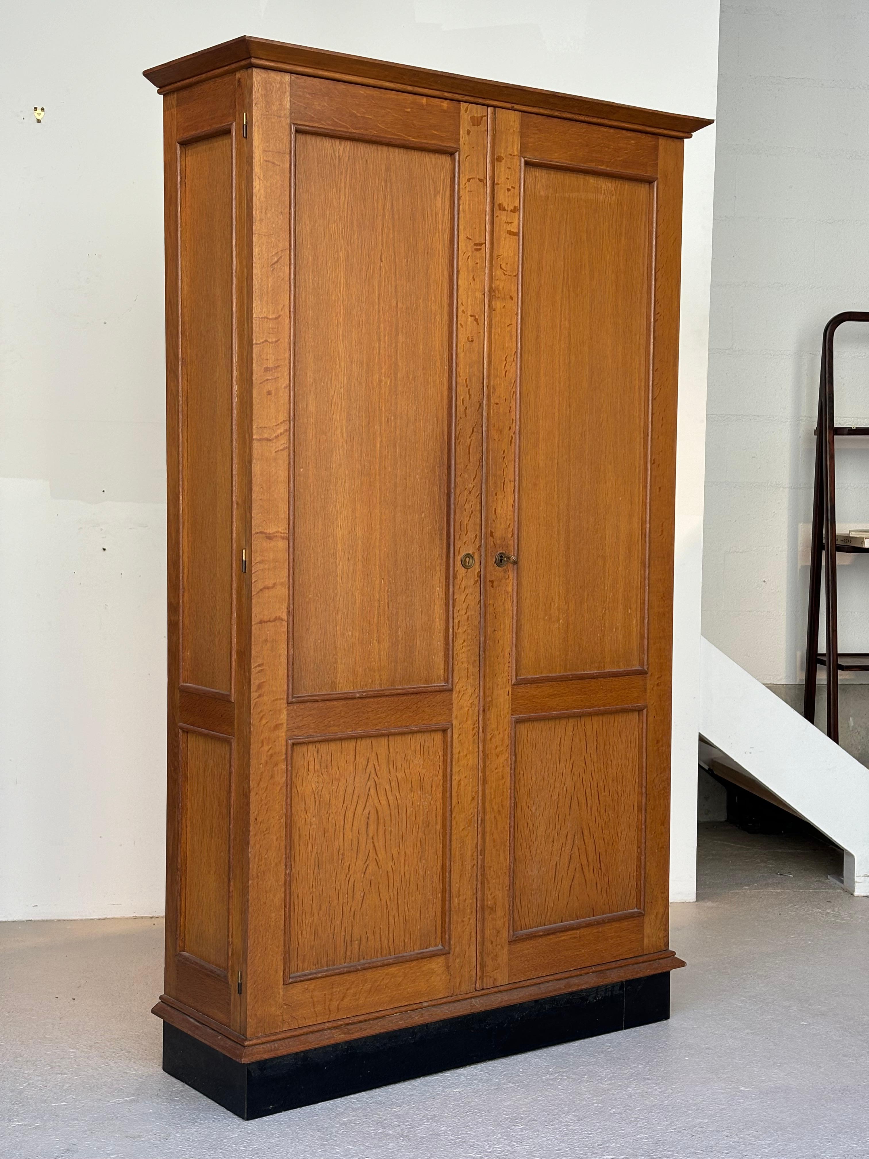 Jacques Adnet wardrobes in oak and formica circa 1950