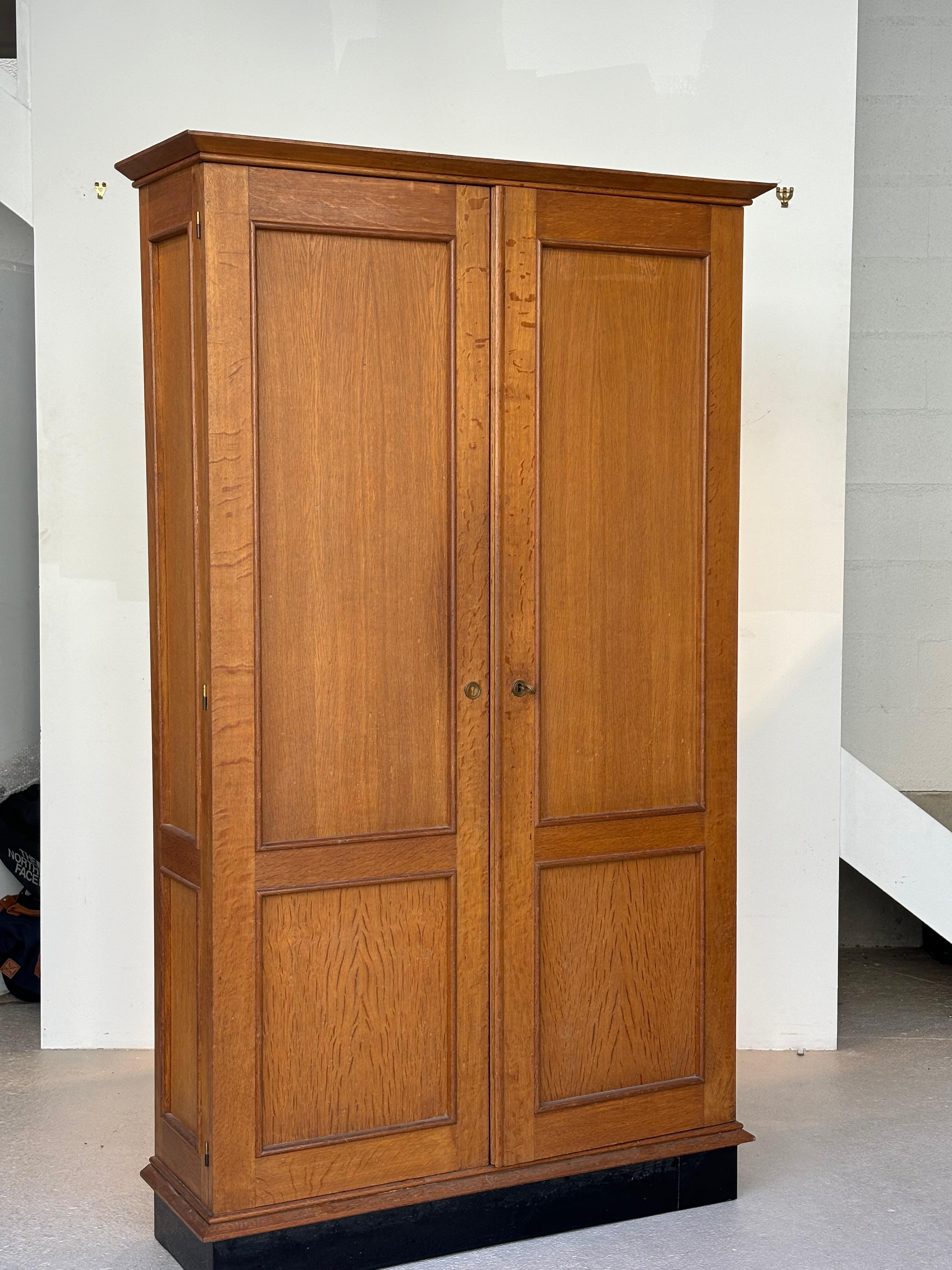 Jacques Adnet wardrobes in oak and formica circa 1950