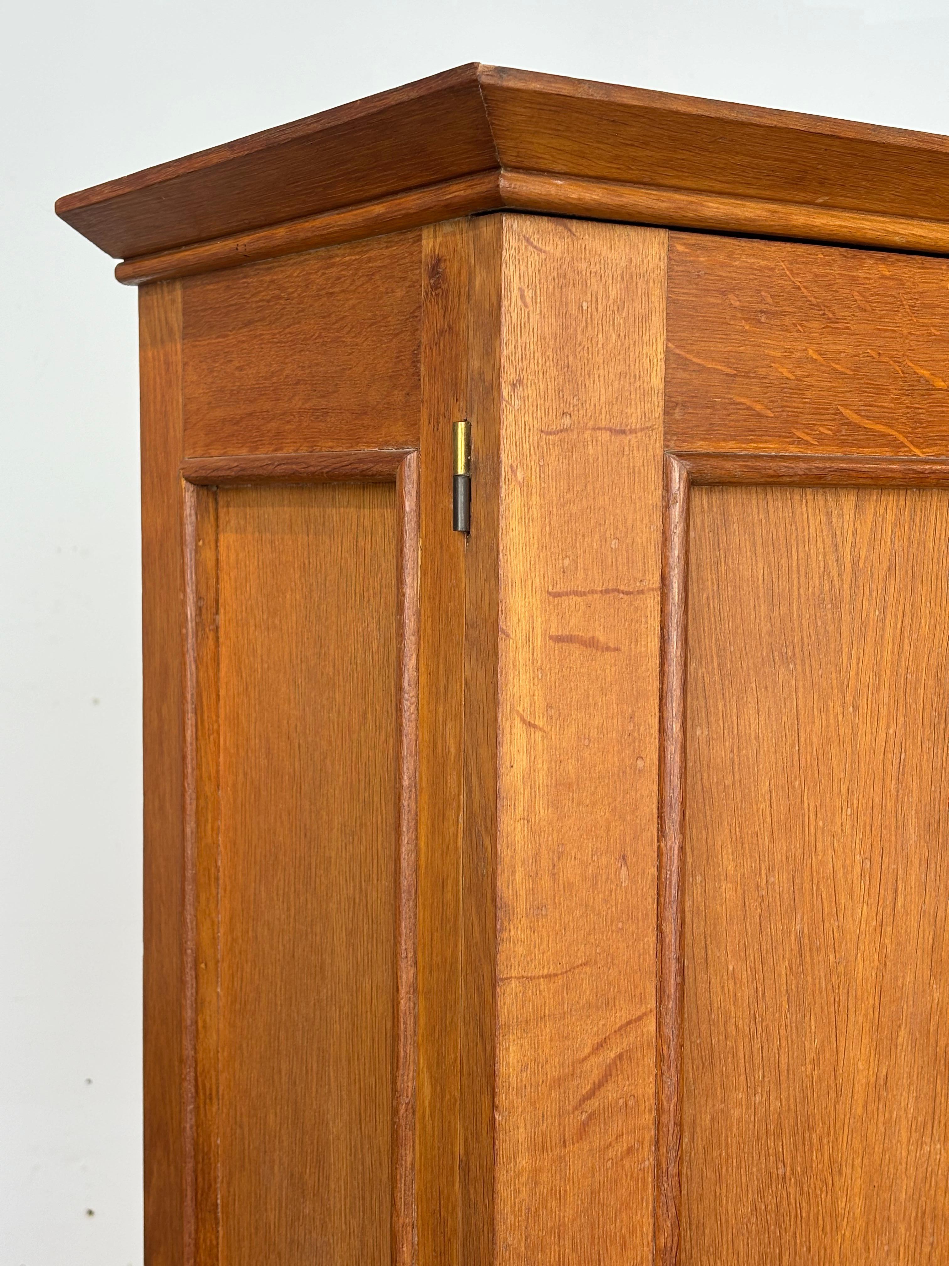 Jacques Adnet wardrobes in oak and formica circa 1950