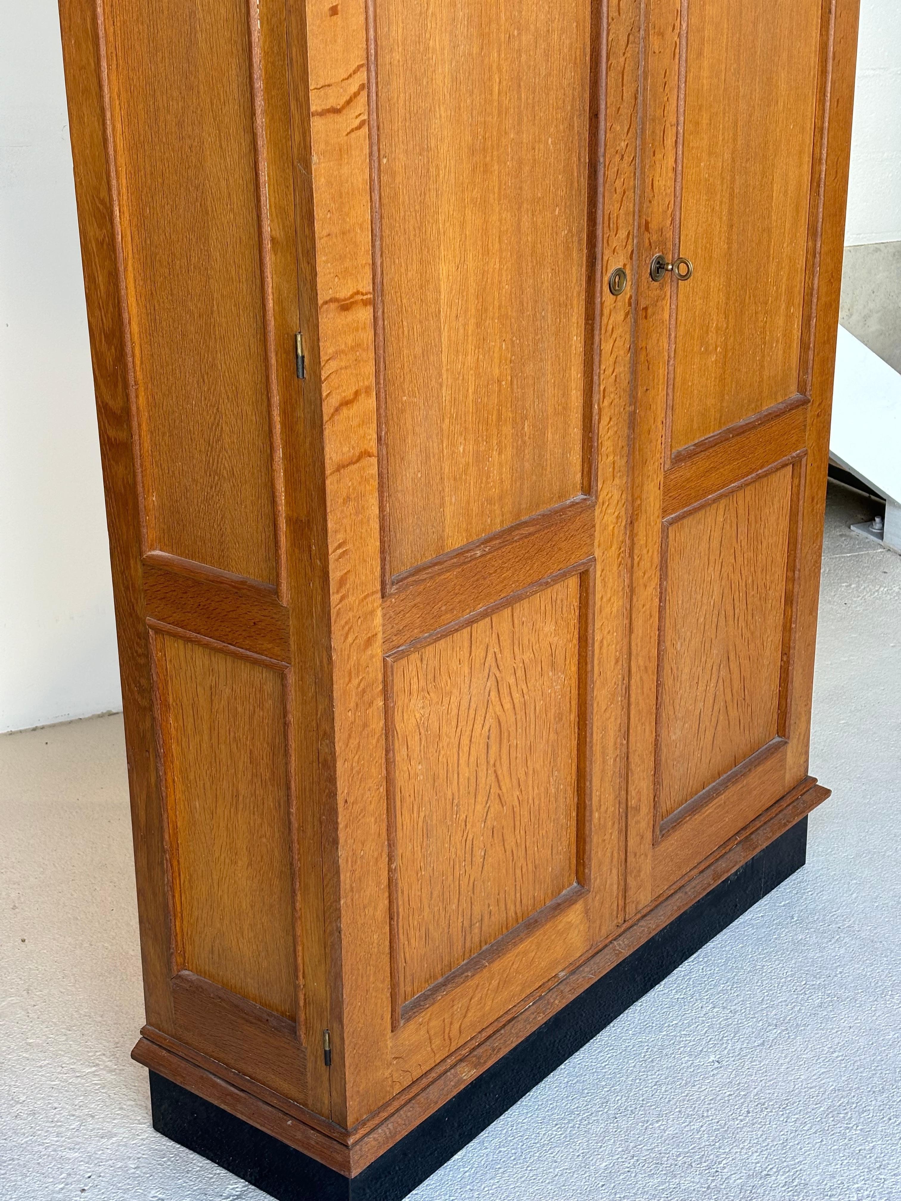Jacques Adnet wardrobes in oak and formica circa 1950