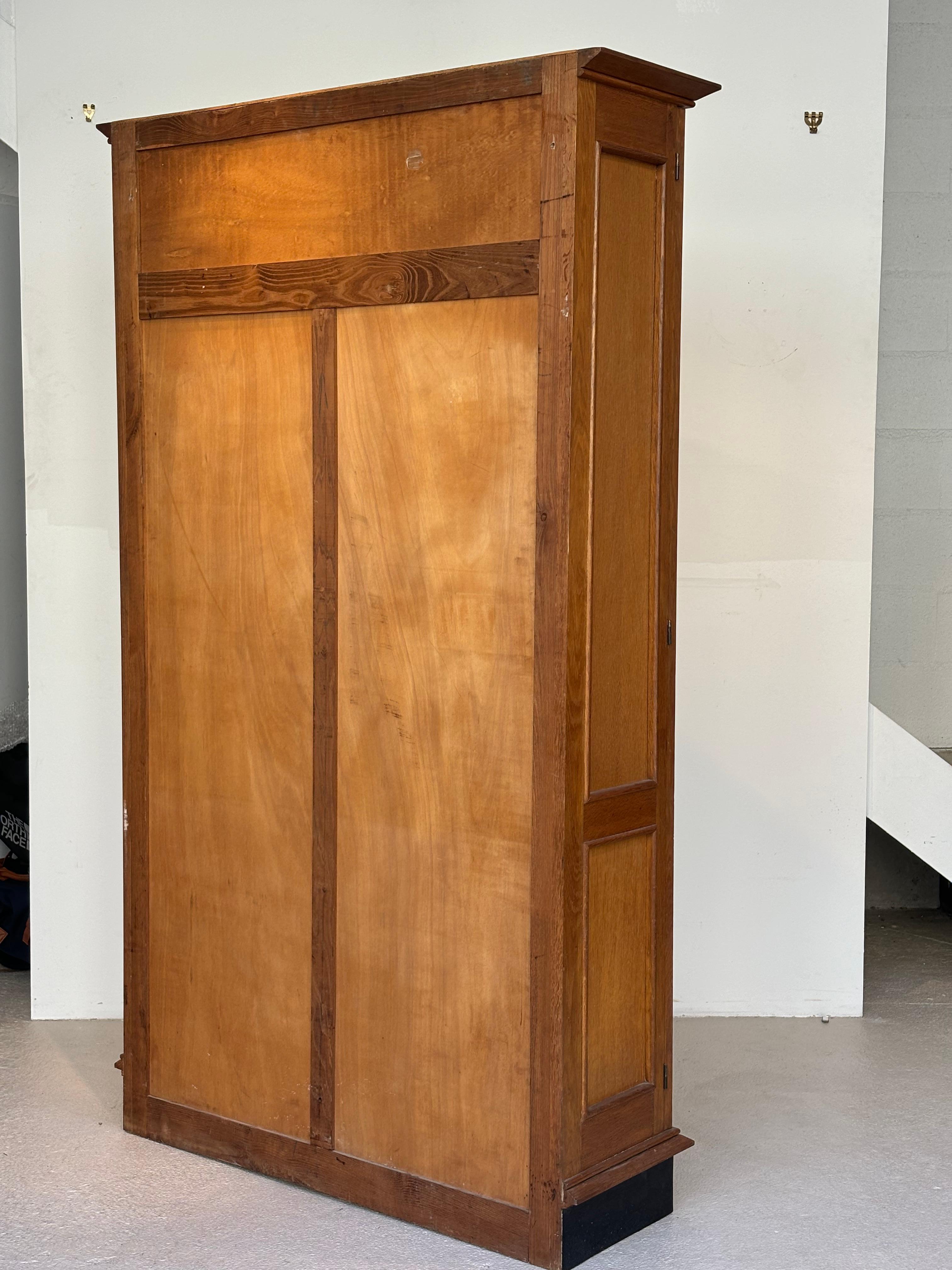Jacques Adnet wardrobes in oak and formica circa 1950