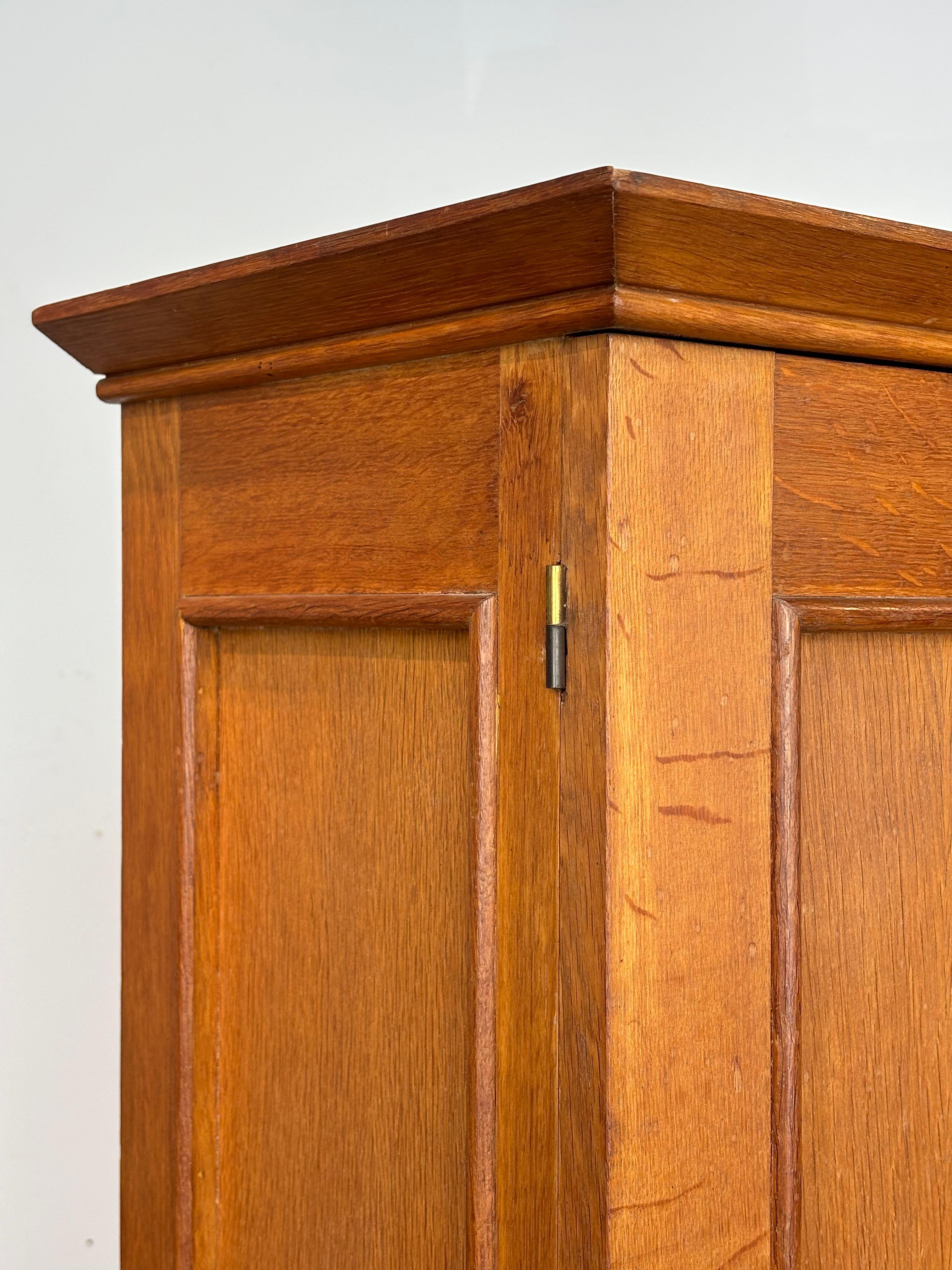 Jacques Adnet wardrobes in oak and formica circa 1950