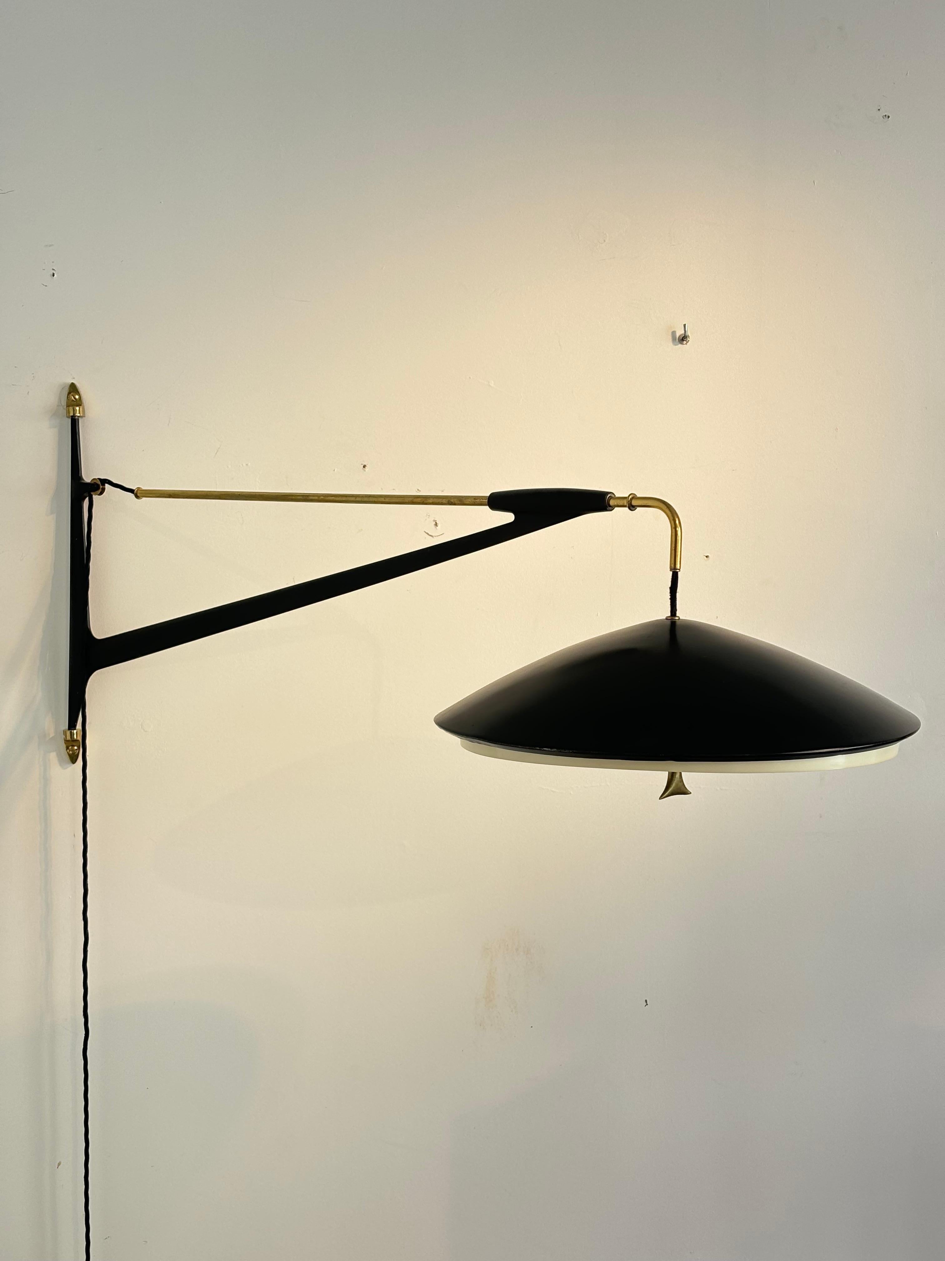 Counterbalancing wall light by Arlus, circa 1960