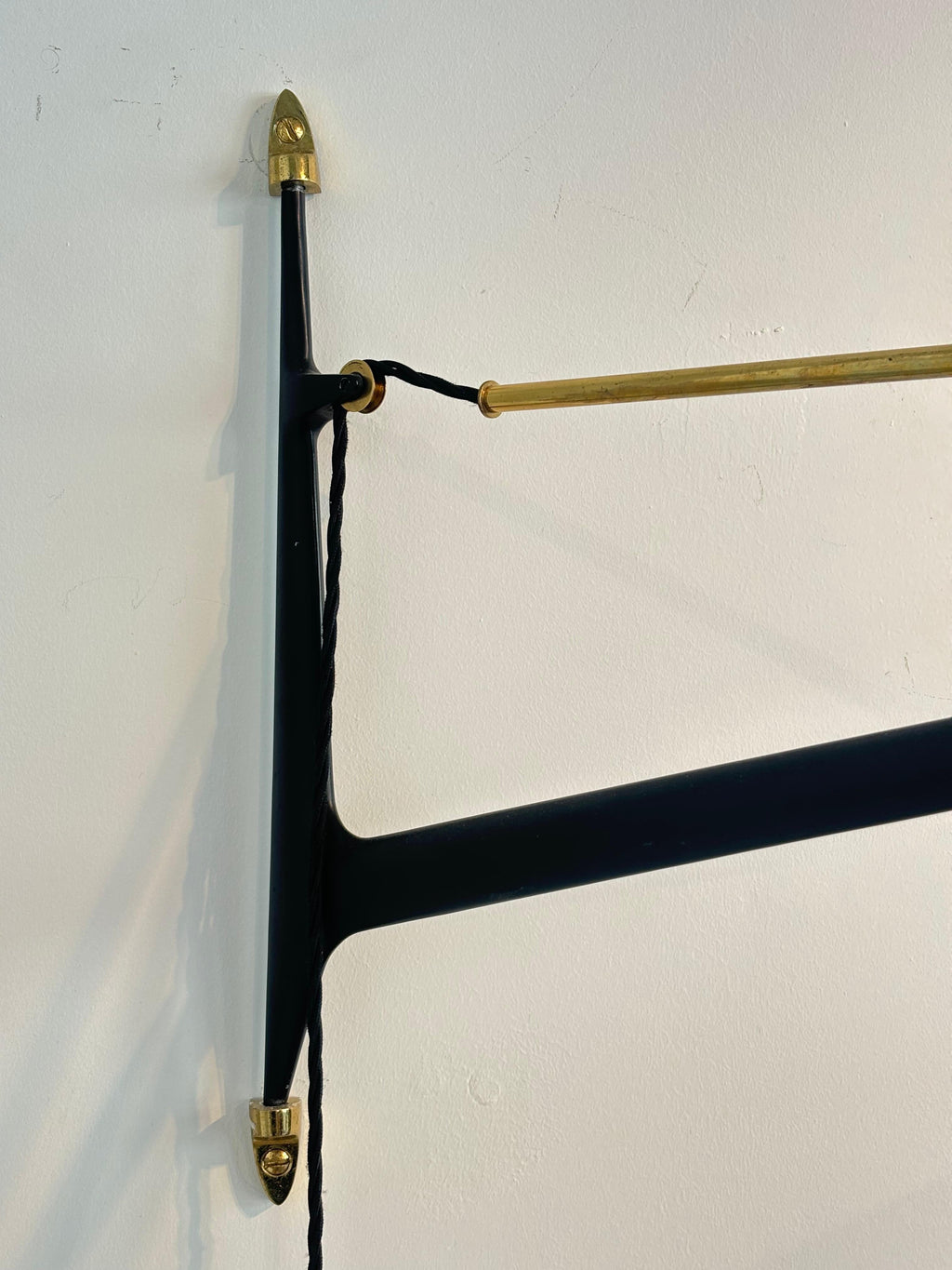 Counterbalancing wall light by Arlus, circa 1960